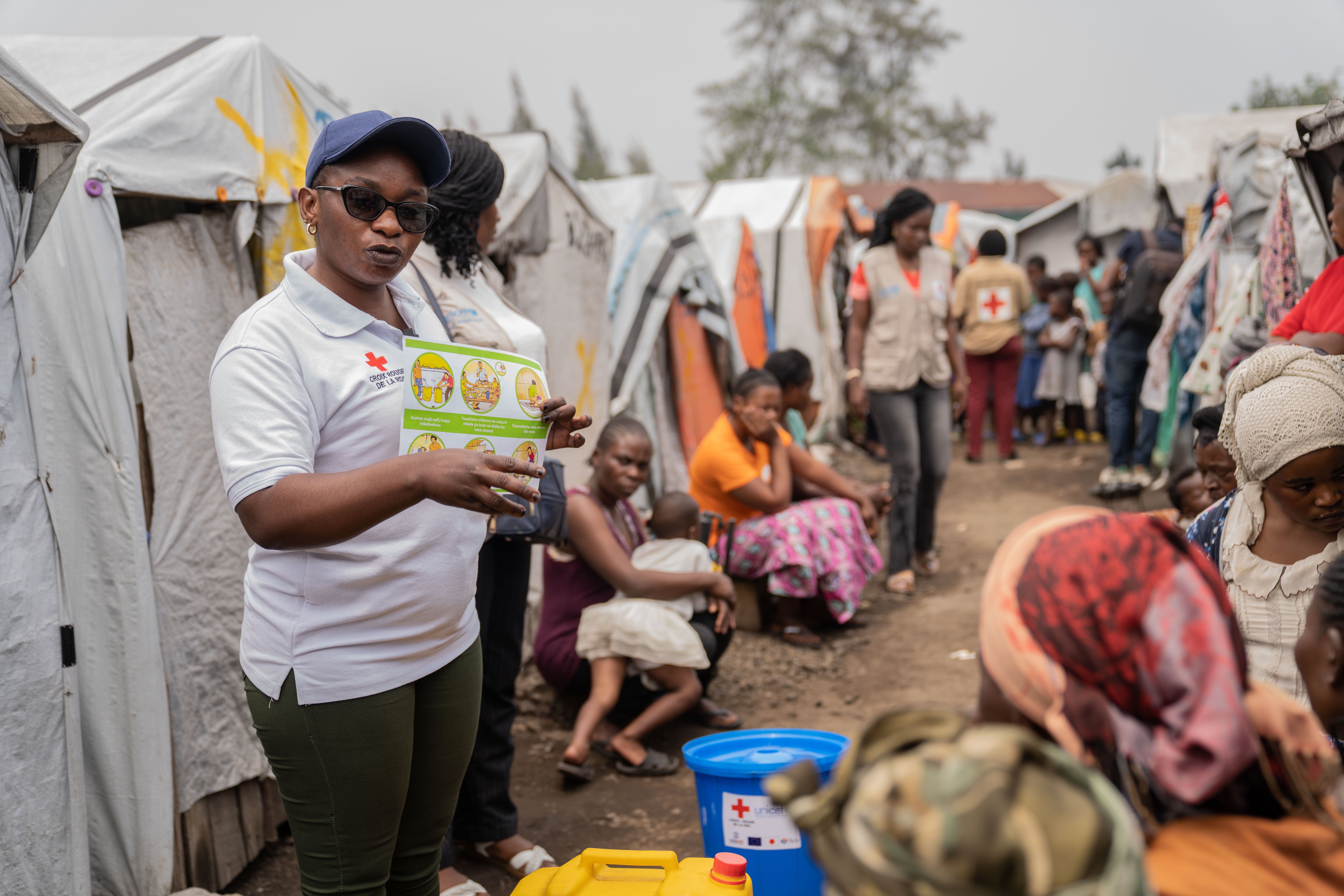 Cross workers raise awareness about mpox and hygiene among internally displaced people in the Don Bosco camps in Goma, Democratic Republic of Congo