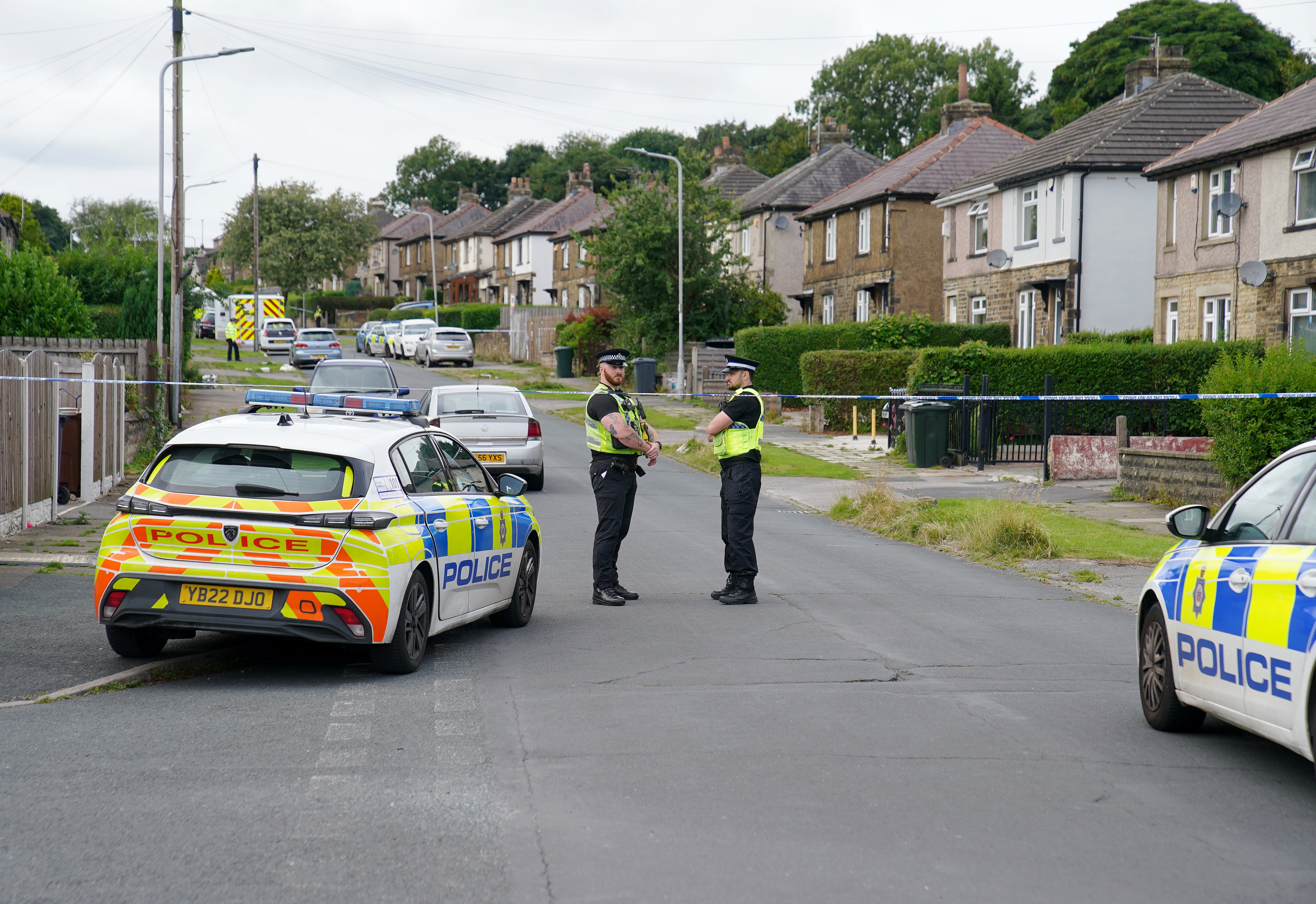 Police in Westbury Road. Officers have also searched a number of other addresses in the area