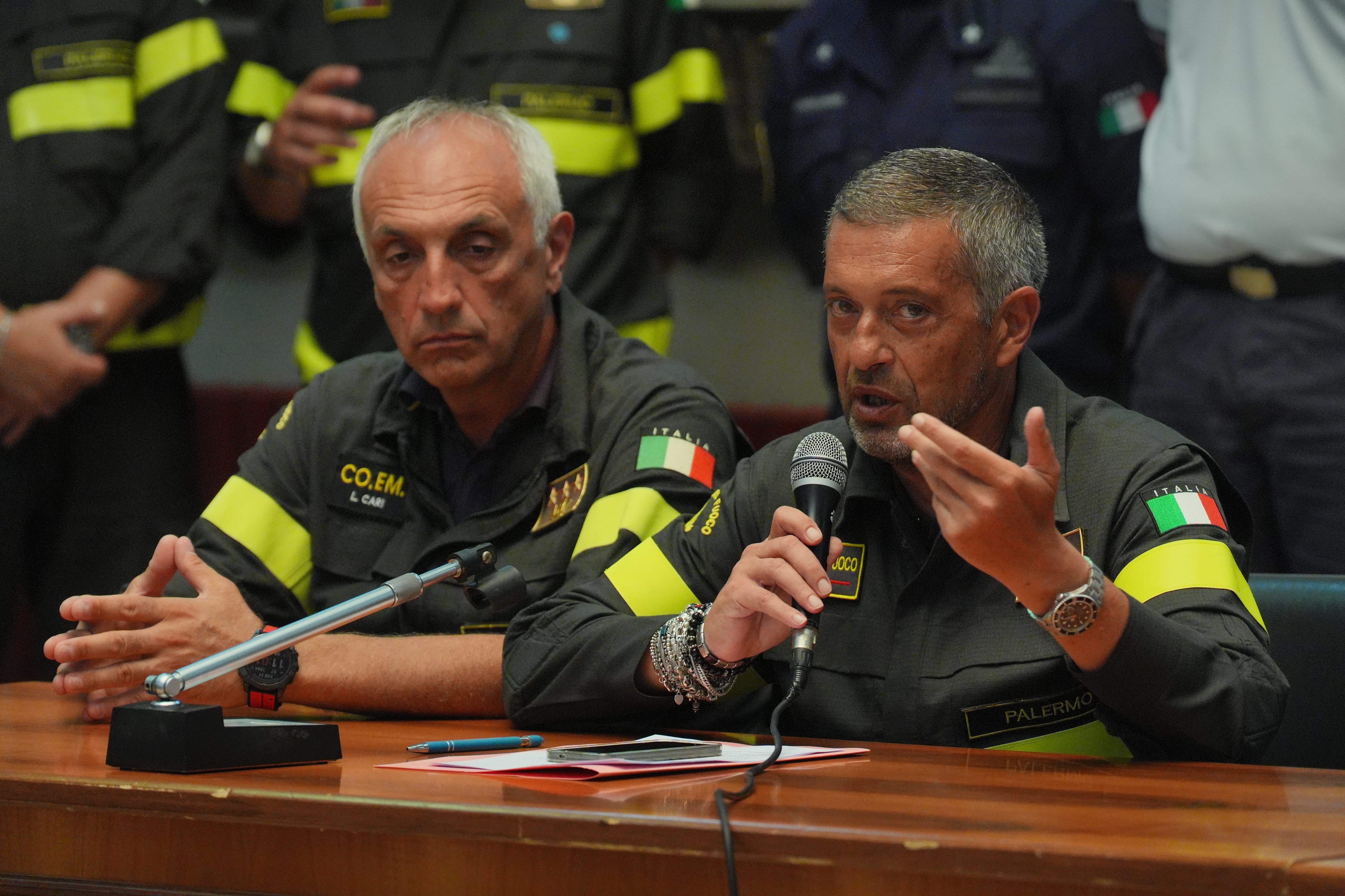 Bentivoglio Fiandra, chief of the Palermo fire brigade (right) told reporters that divers were faced with ‘very little visibility due to the weather conditions’ (Jonathan Brady/PA)