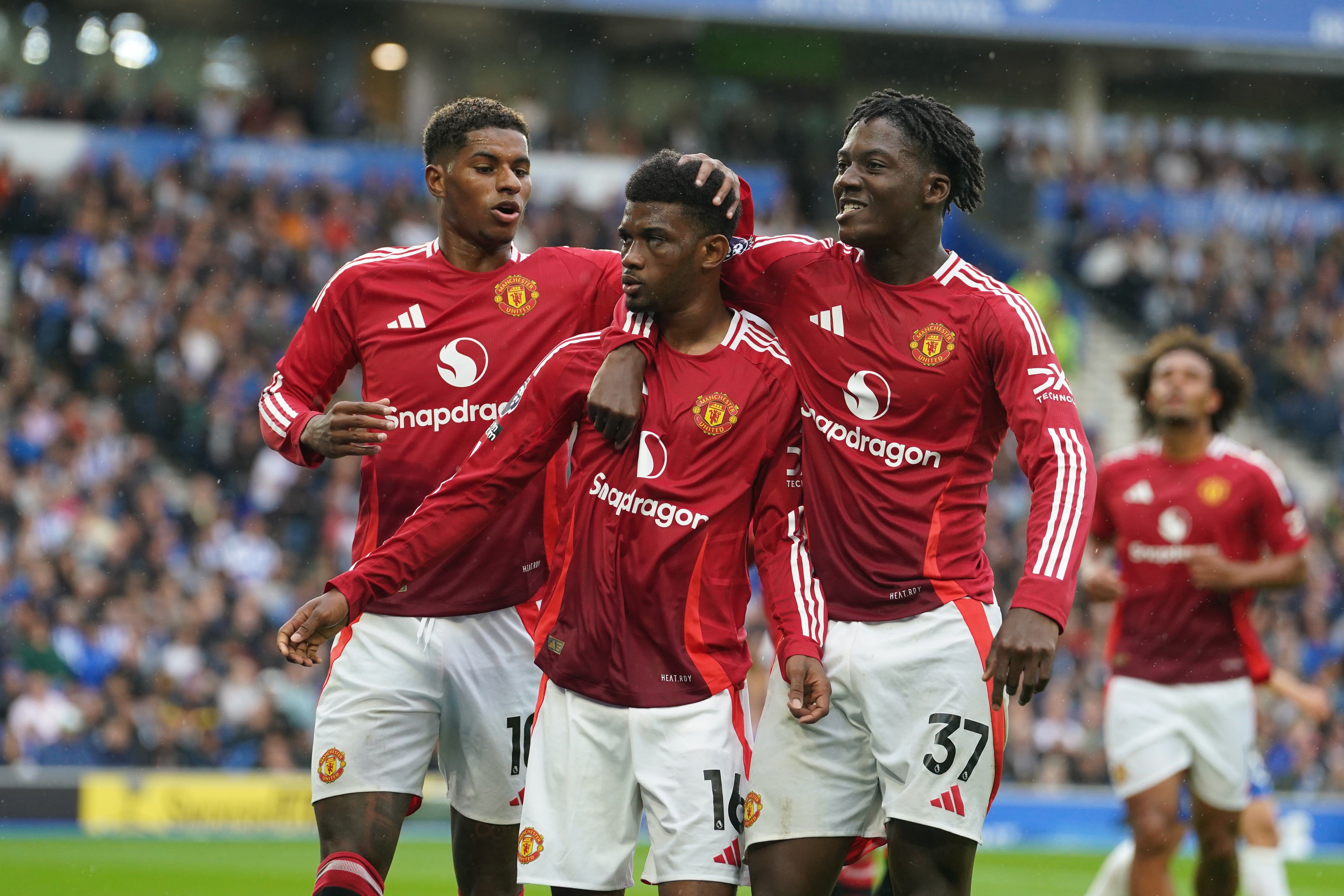 Amad Diallo, centre, had fired United level (Gareth Fuller/PA)