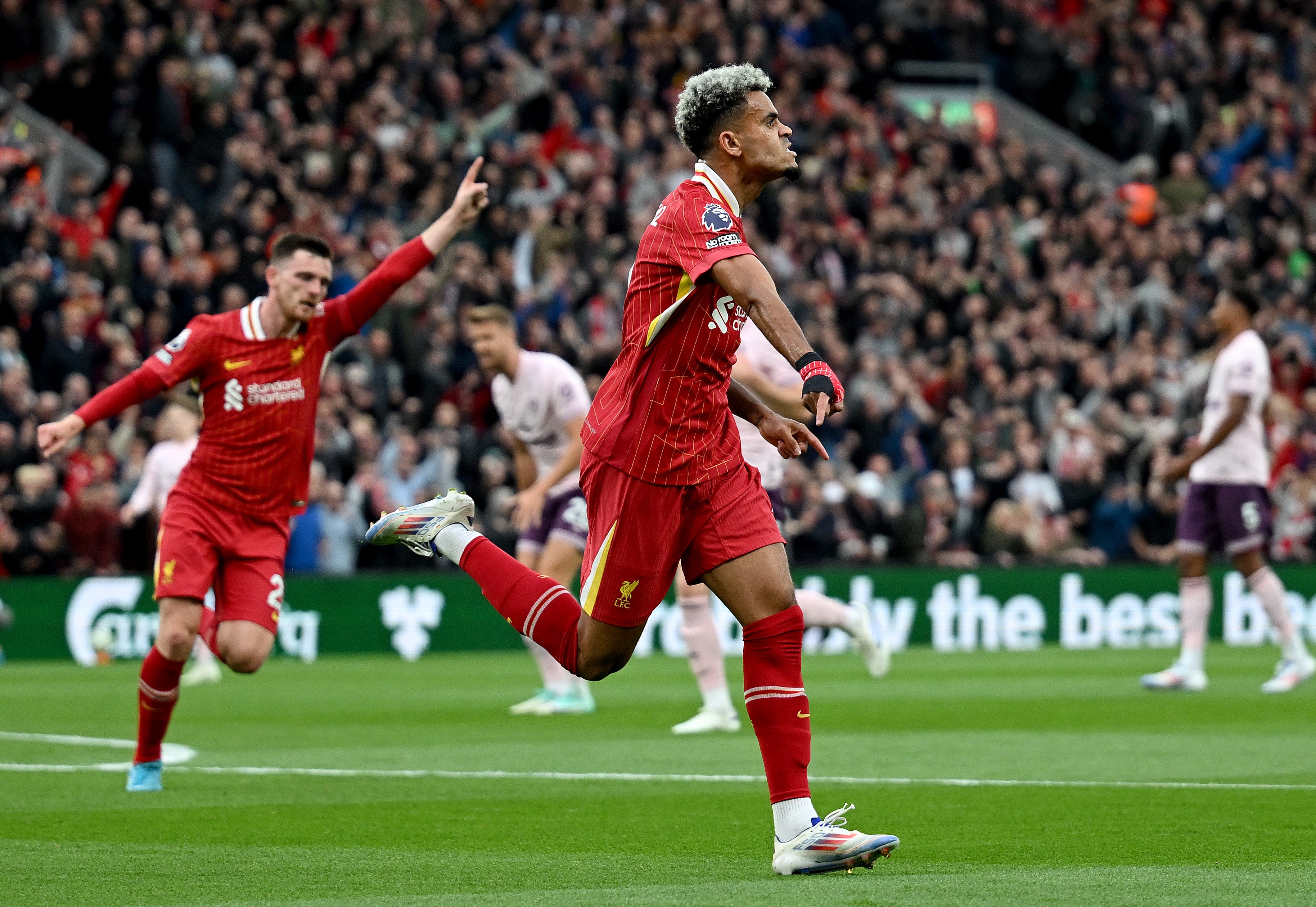 Luis Diaz celebrates after giving Liverpool the lead