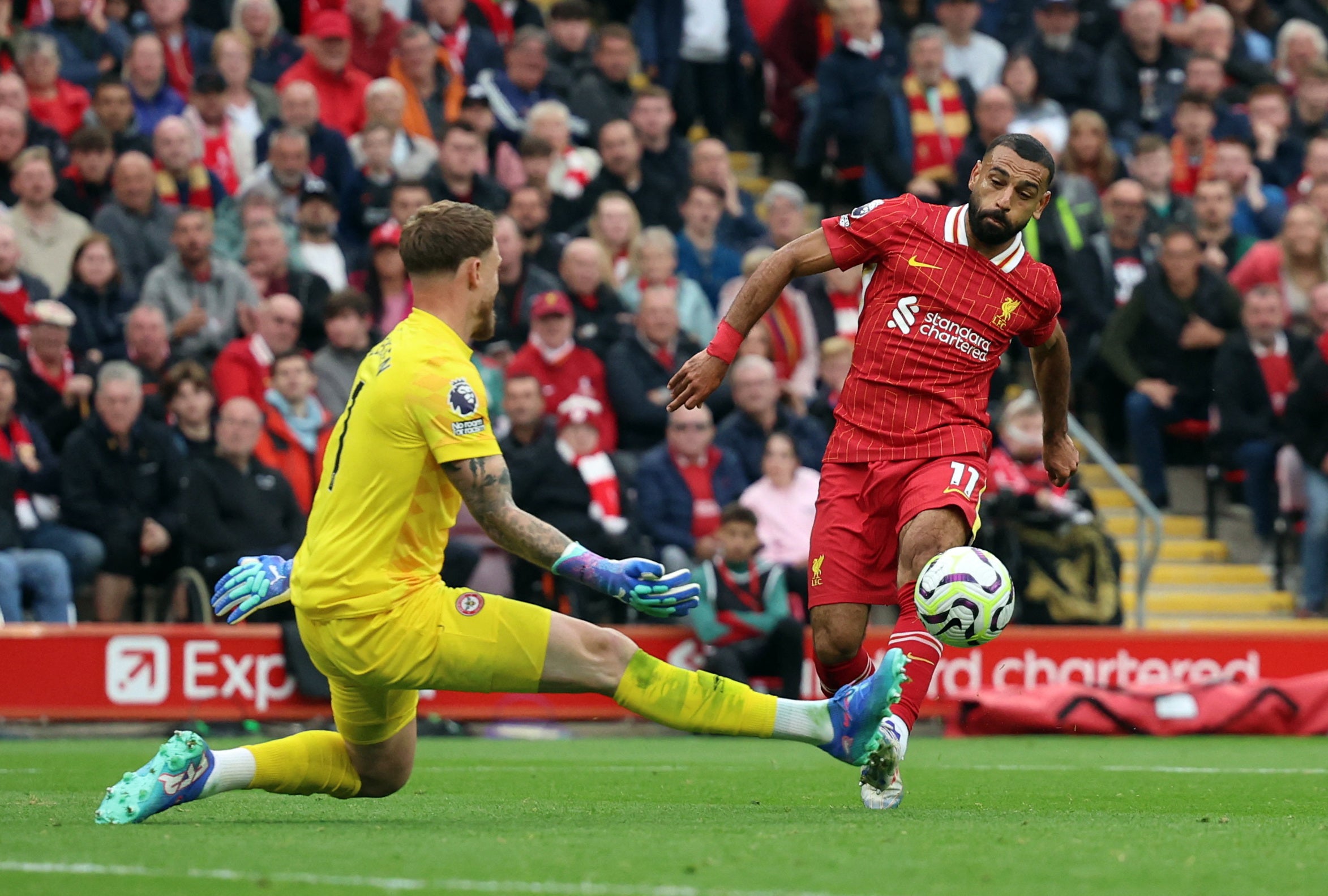 Mohamed Salah bends home Liverpool’s second goal