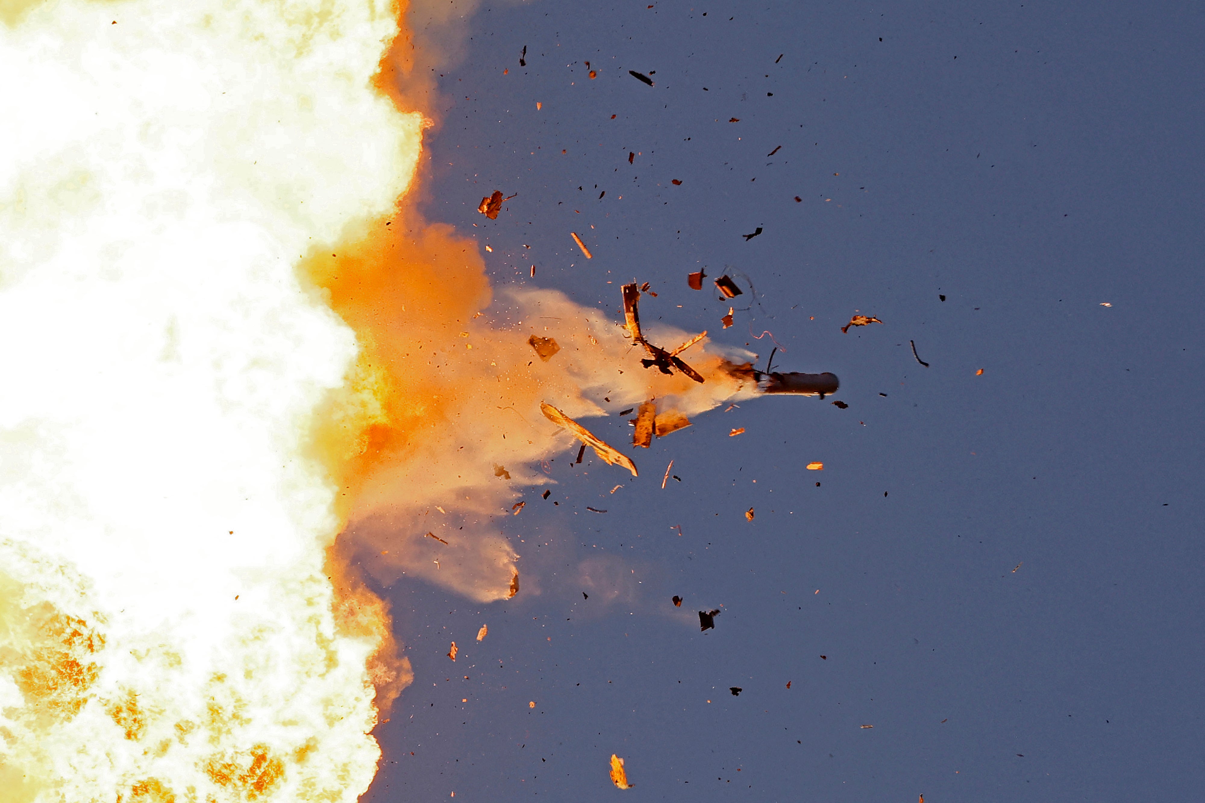 This photo taken from a position in northern Israel shows a Hezbollah UAV intercepted by Israeli air forces over north Israel on 25 August 2024