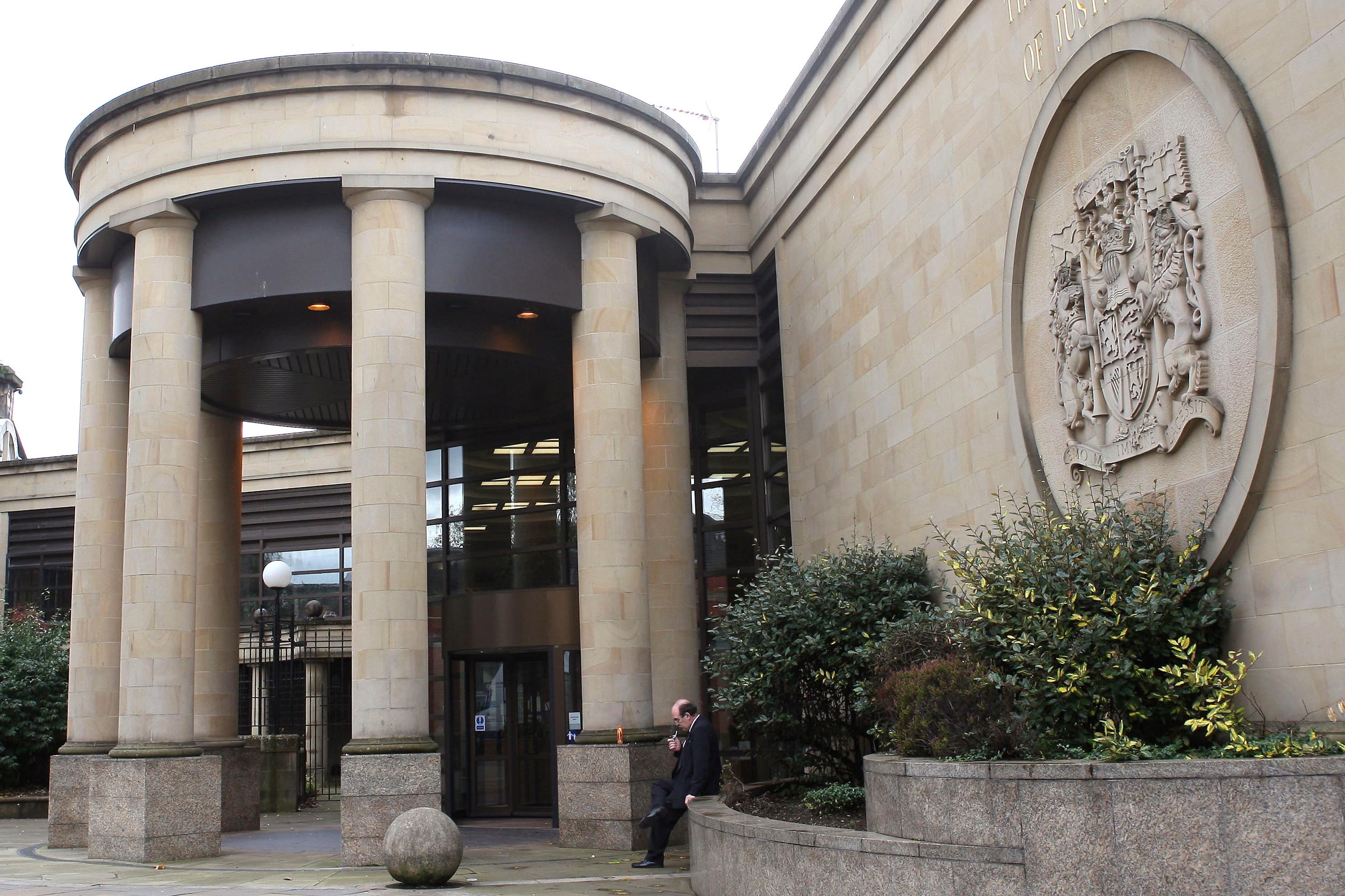 The trial is taking place at the High Court in Glasgow (David Cheskin/PA)