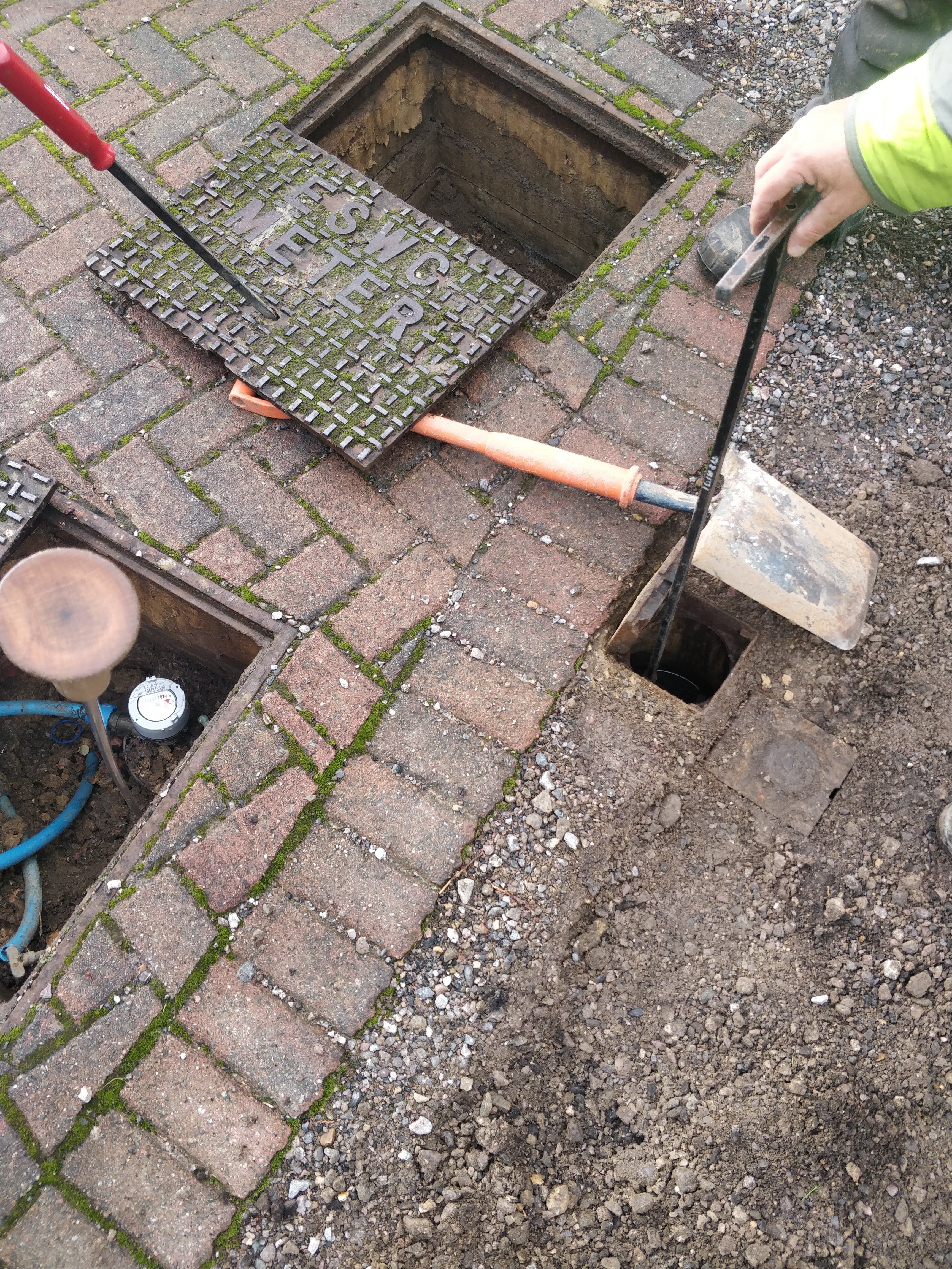 A new water meter being installed in the ground