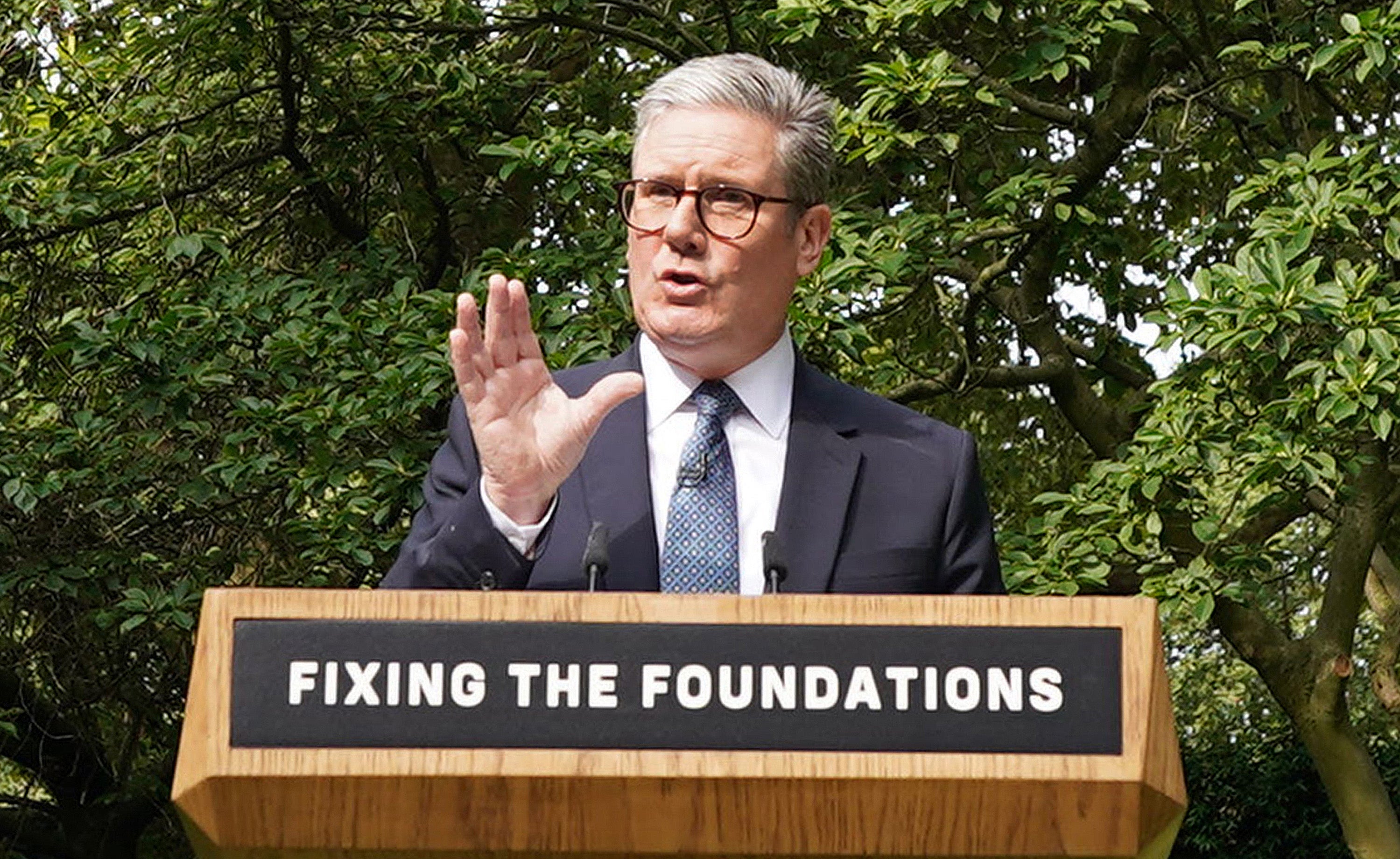 Keir Starmer speaks during a press conference in the Rose Garden at 10 Downing Street in central London on August 27