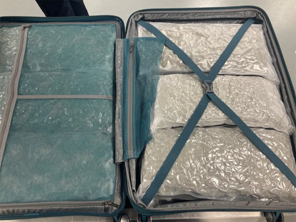 A suitcase full of cannabis seized from Lyndsey Russell, 38, from Grimsby, who was arrested at Manchester Airport after flying in from Thailand, and jailed for 21 months in June this year