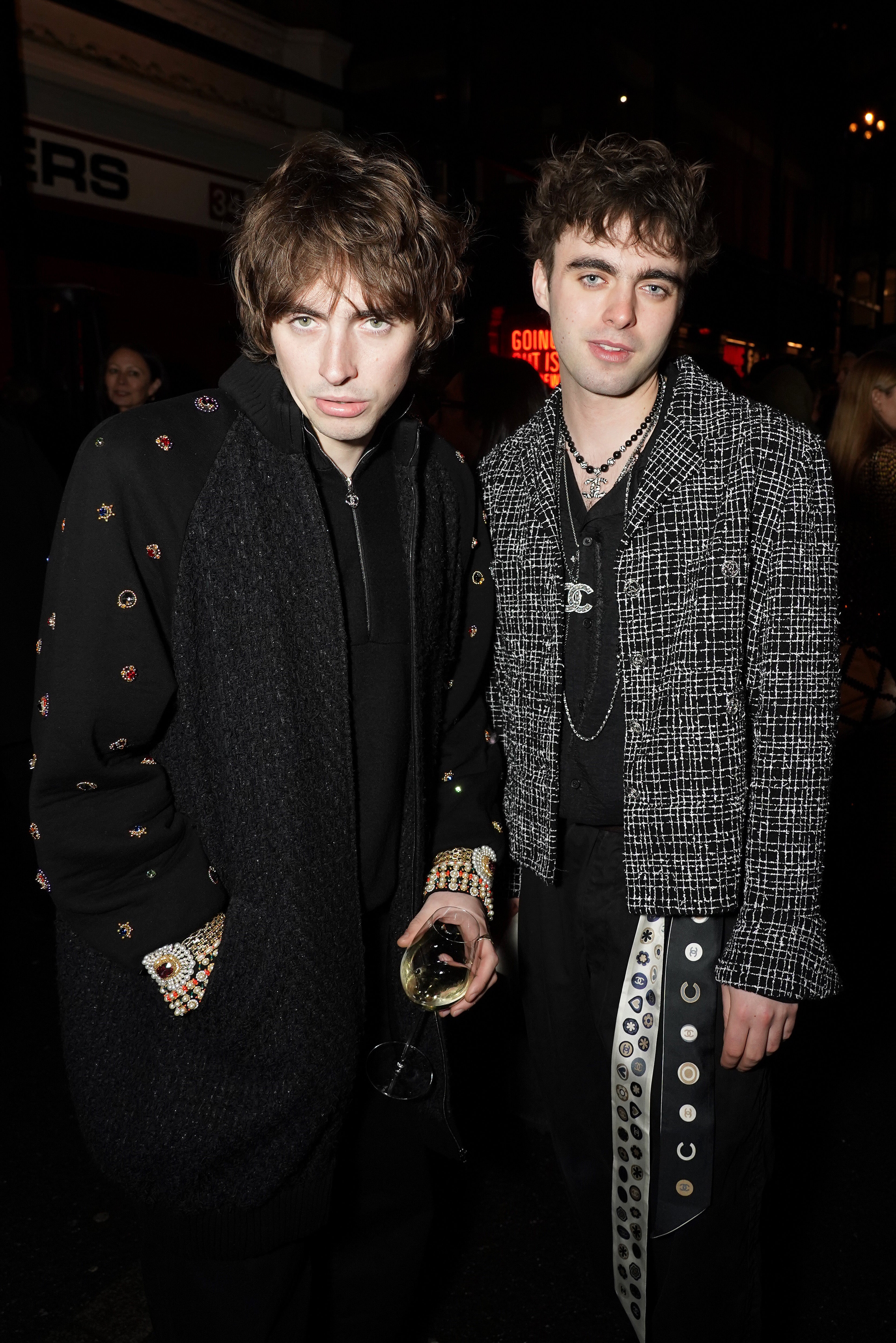 Gene and Lennon Gallagher pictured at the Chanel Metiers D’Art Show in 2023