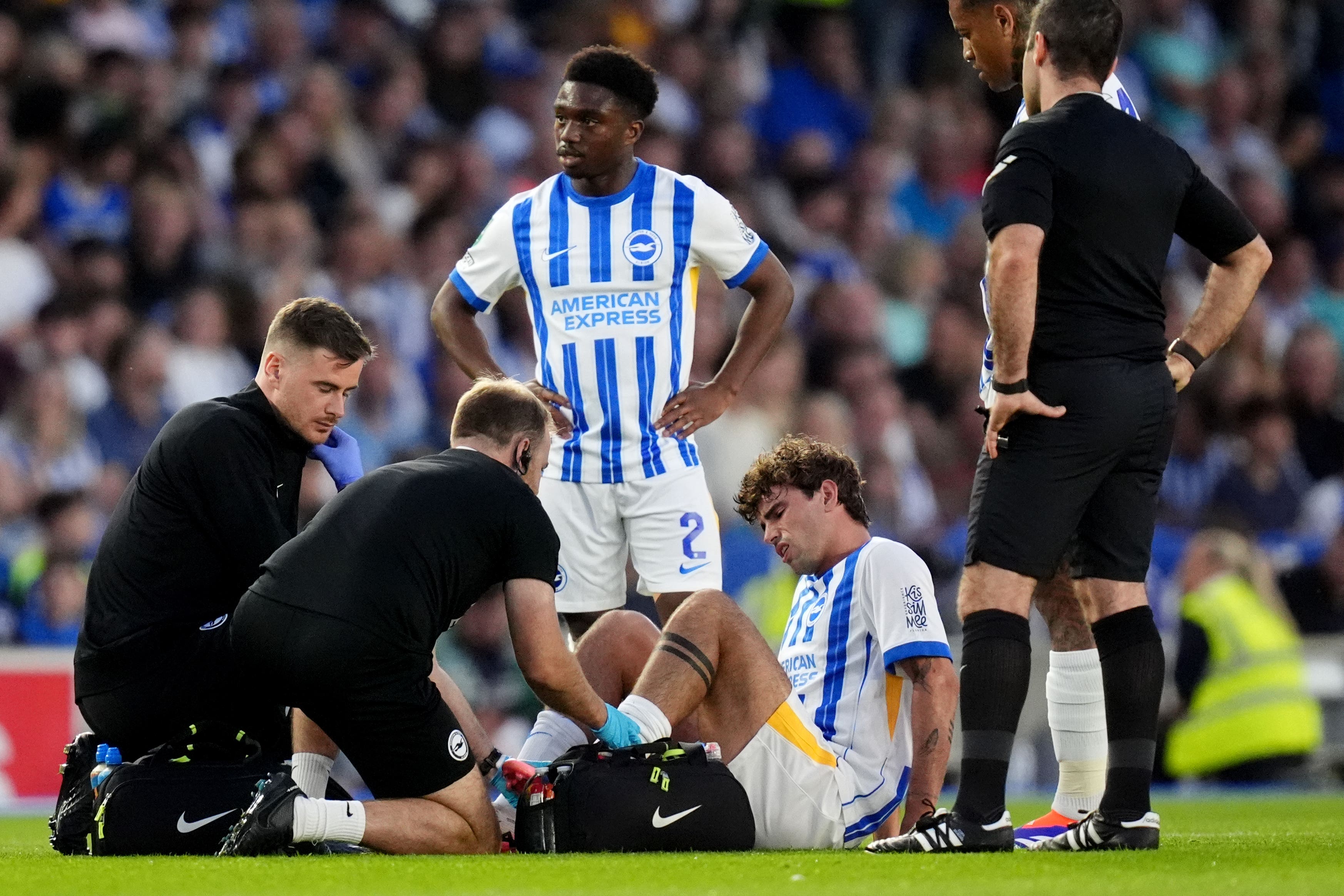 Matt O’Riley (second right) limped off after just 10 minutes of his debut (John Walton/PA)