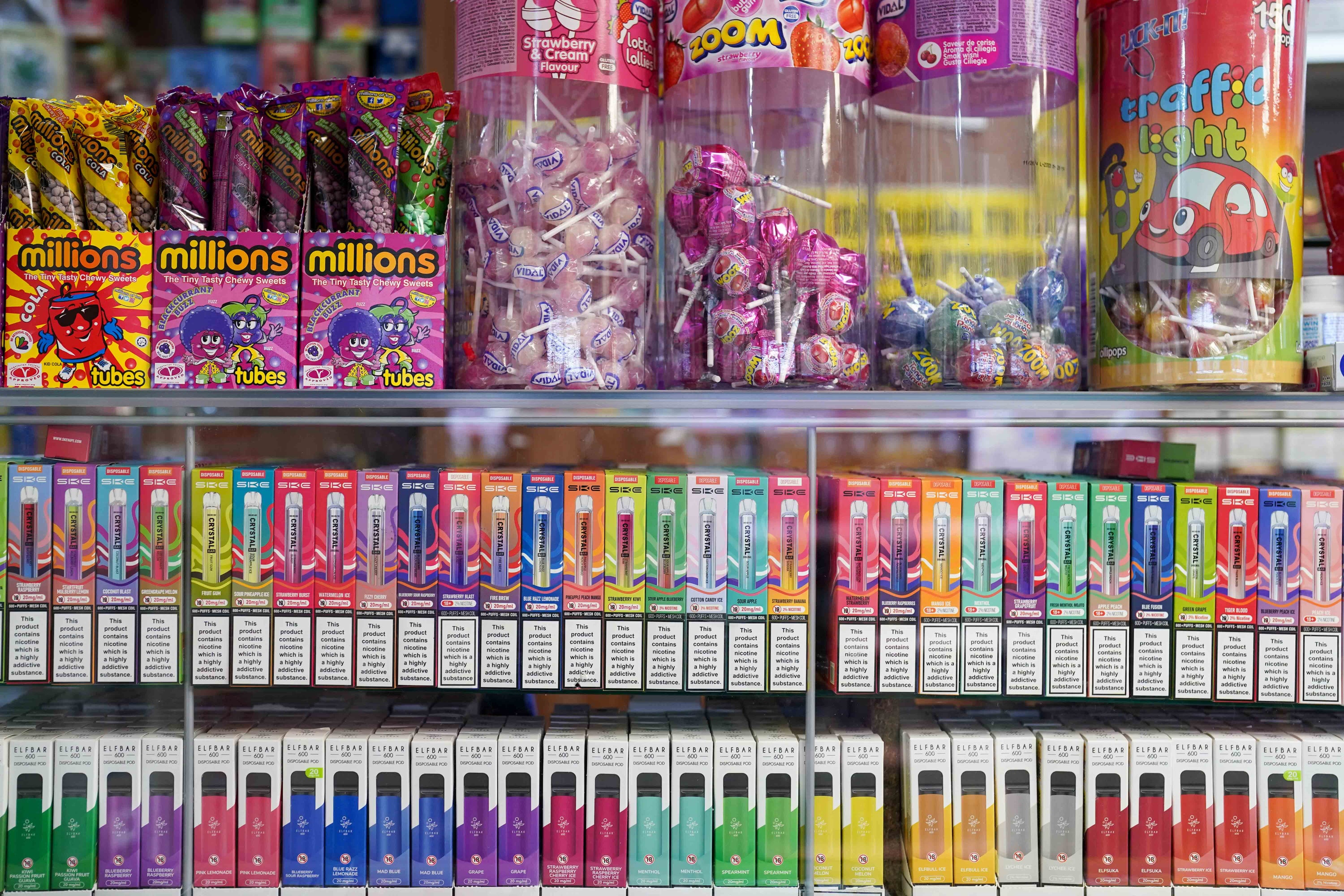 Disposable vapes of varying flavours on sale in a store (Jacob King/PA)