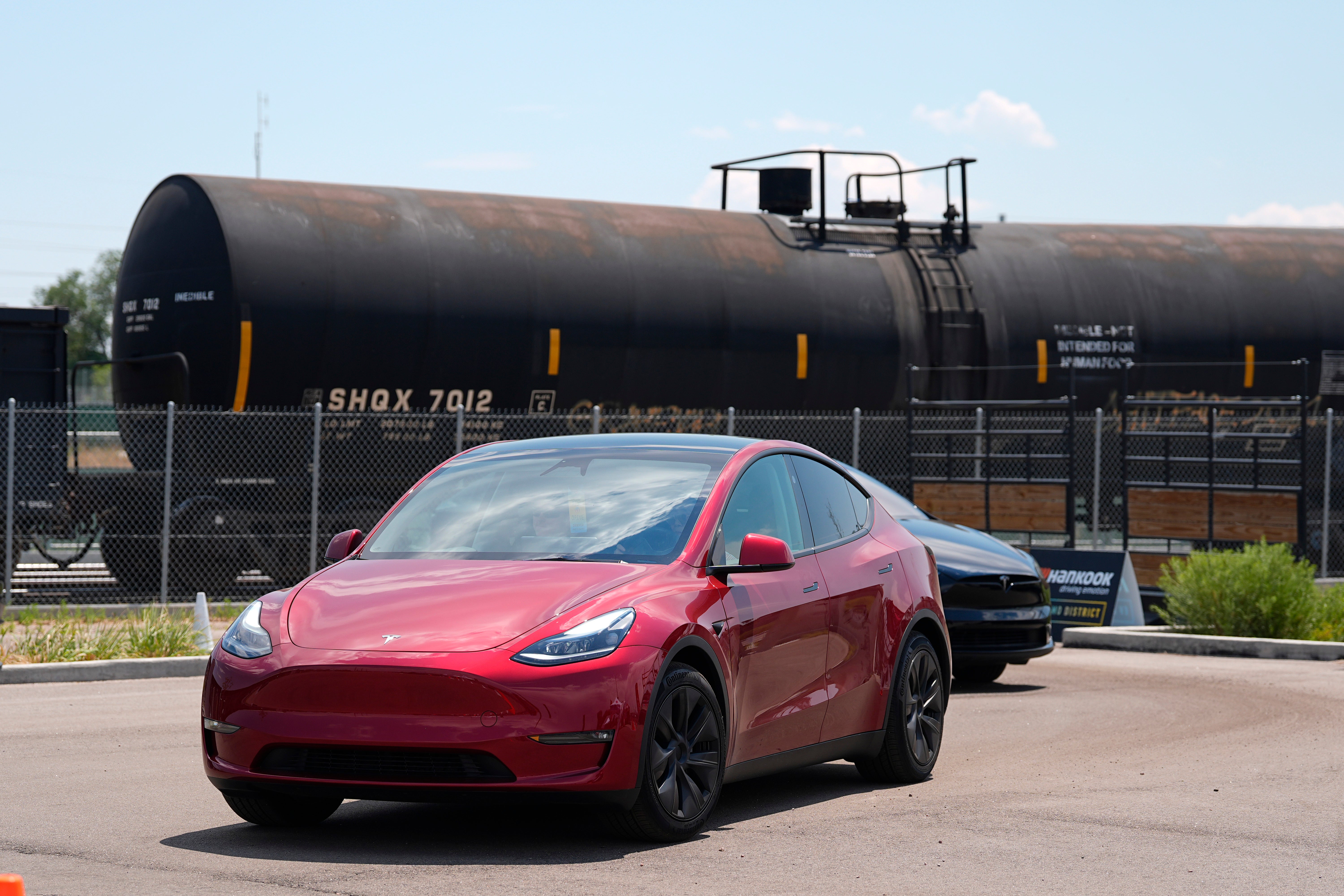 Drivers guide 2024 a Tesla Model 3 sedan and Model X utility vehicle
