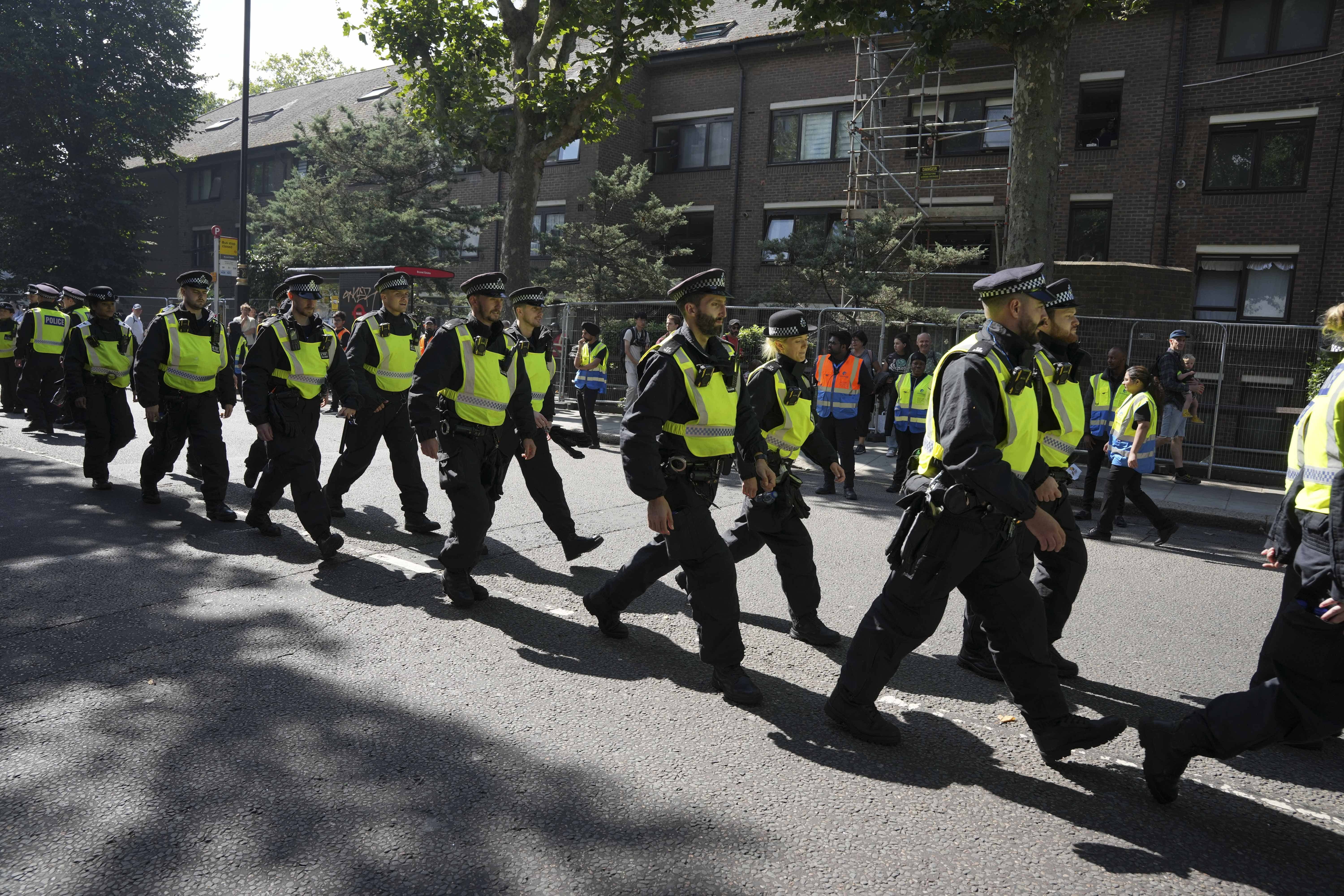 Police officers on duty at the carnival Notting Hill Carnival (Jeff Moore/PA)