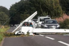 Two survive horror light aircraft crash as glider nosedives onto Cotswolds road