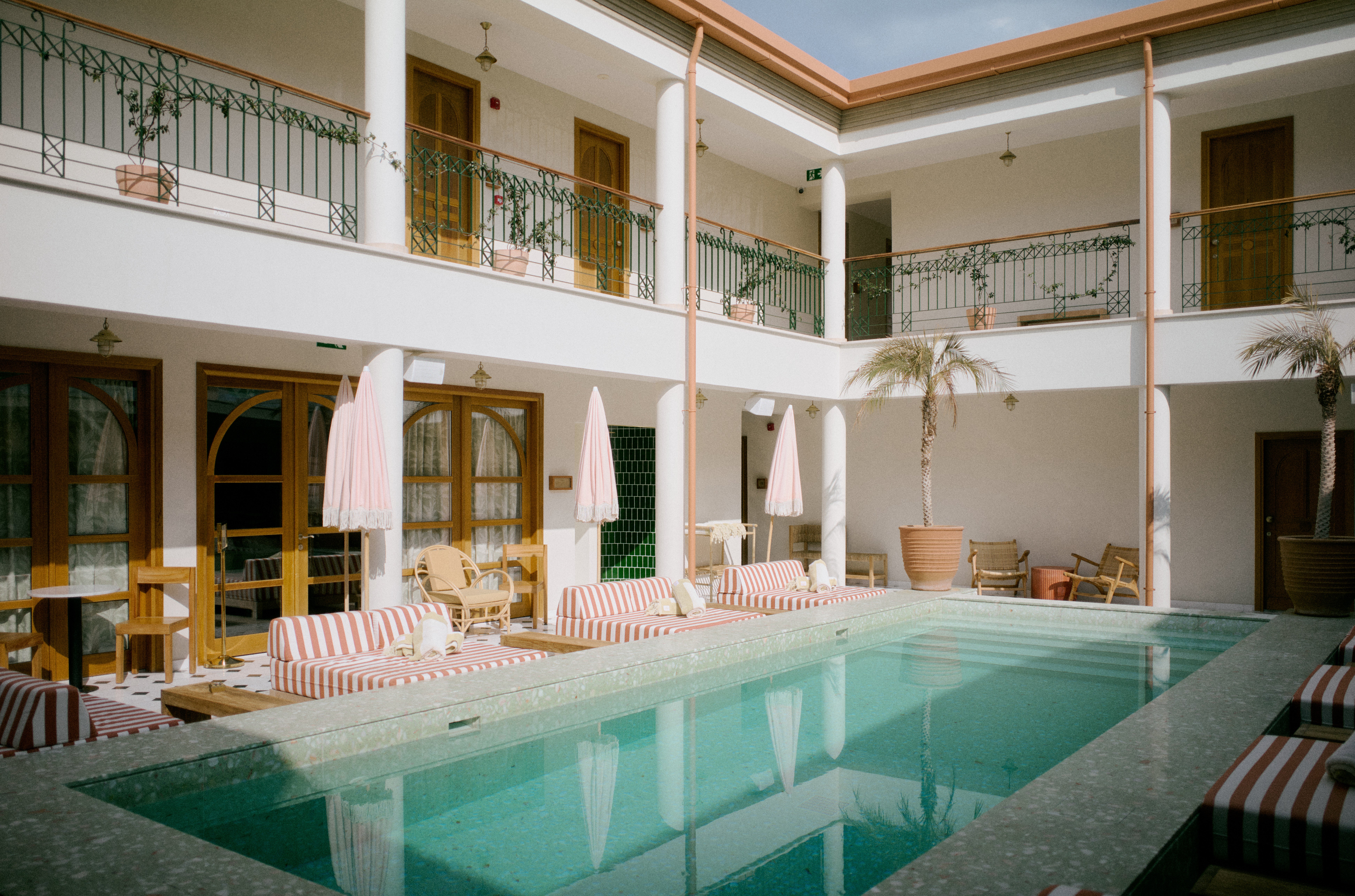 The 18 rooms of the Agora Hotel surround a pool in the courtyard