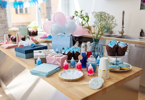 Couple invites bride and groom to baby shower on their wedding day