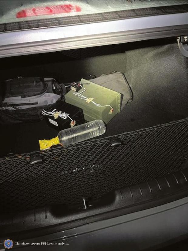 Two improvised explosive devices can be seen in the trunk of the car of Thomas Matthew Crooks