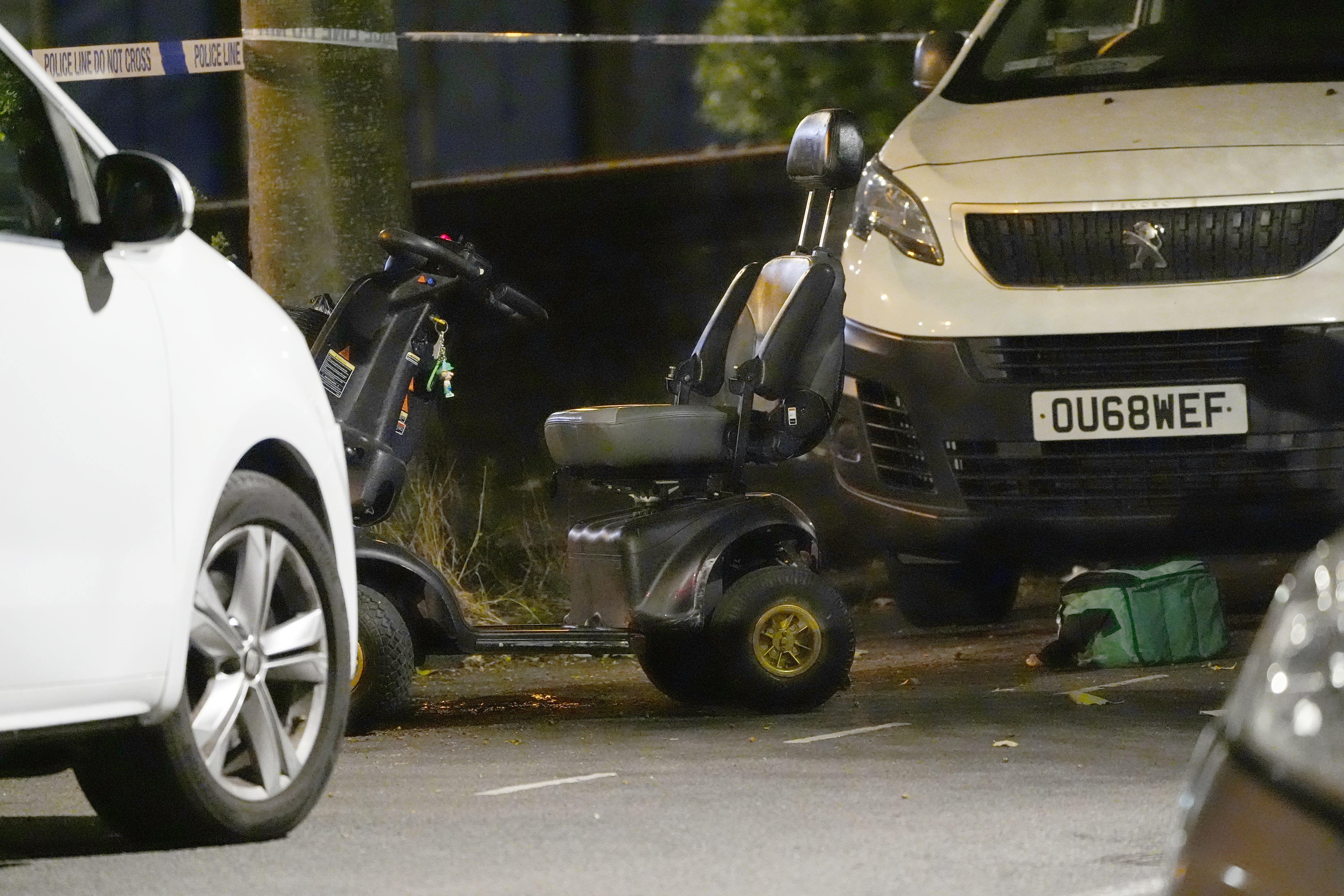 A black and grey electric wheelchair could be seen standing behind the cordon close to a forensics tent at the scene late on Wednesday evening