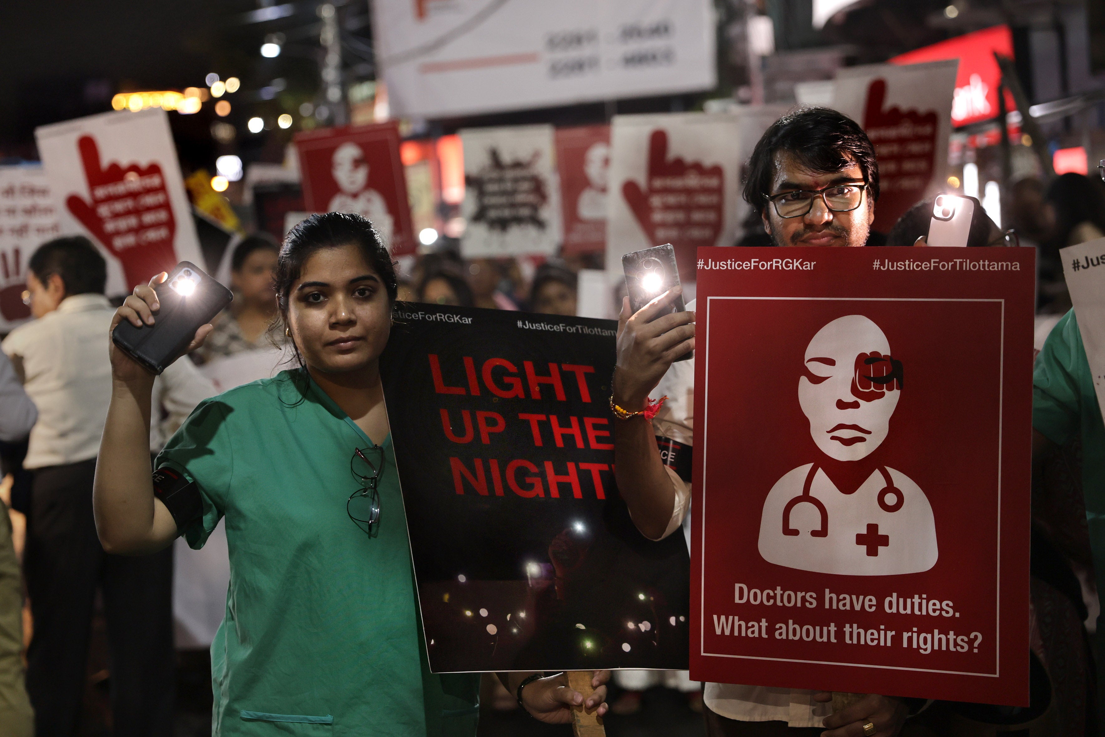 Medical students, doctors and members of the civil society attend a candlelight protest march as they demand justice after an alleged rape and murder incident in Kolkata, India, on 23 August 2024