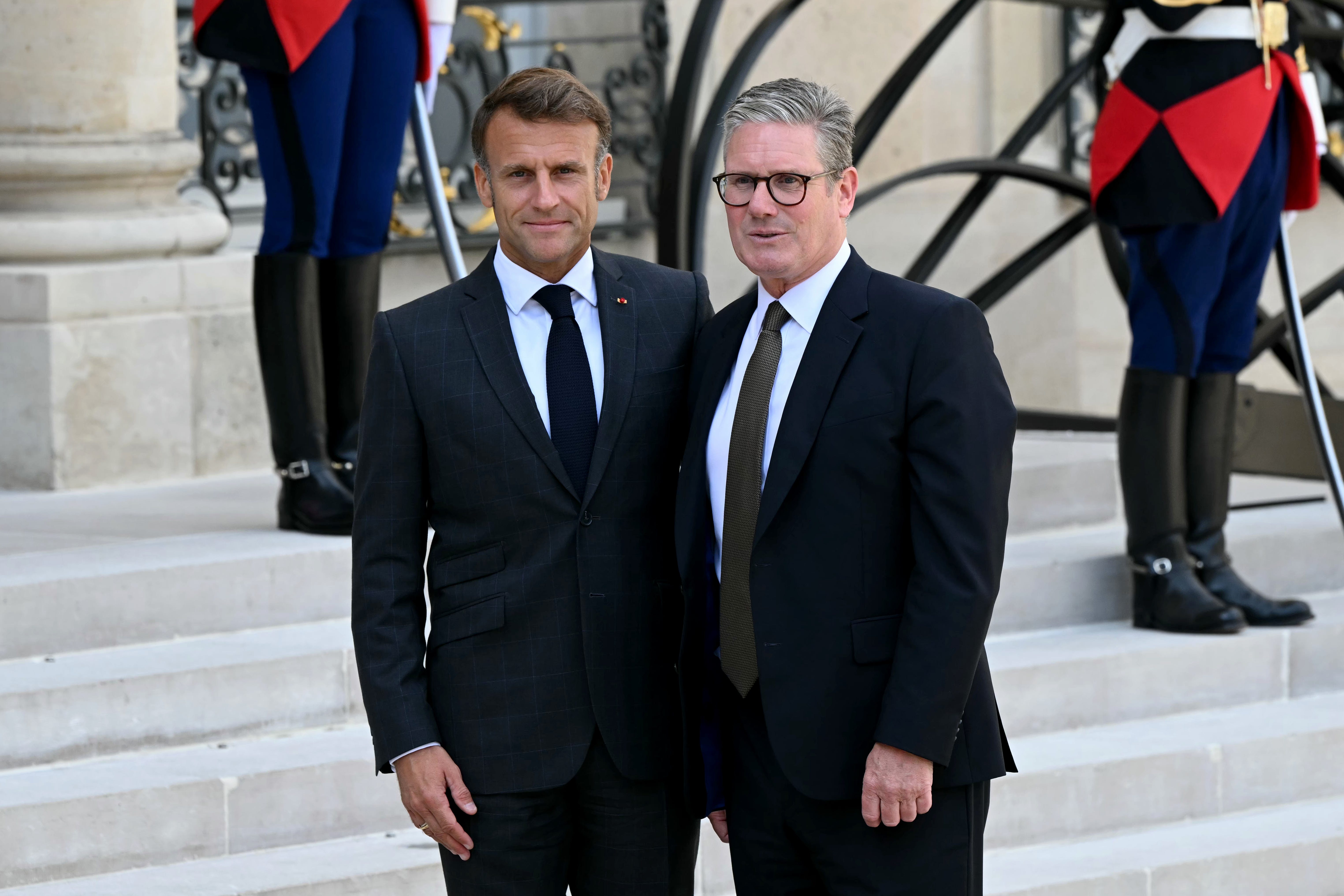 Prime Minister Sir Keir Starmer (right) is greeted by Emmanuel Macron, President of France, as he arrives at the Elysee presidential palace for a meeting in Paris (Justin Tallis/PA)