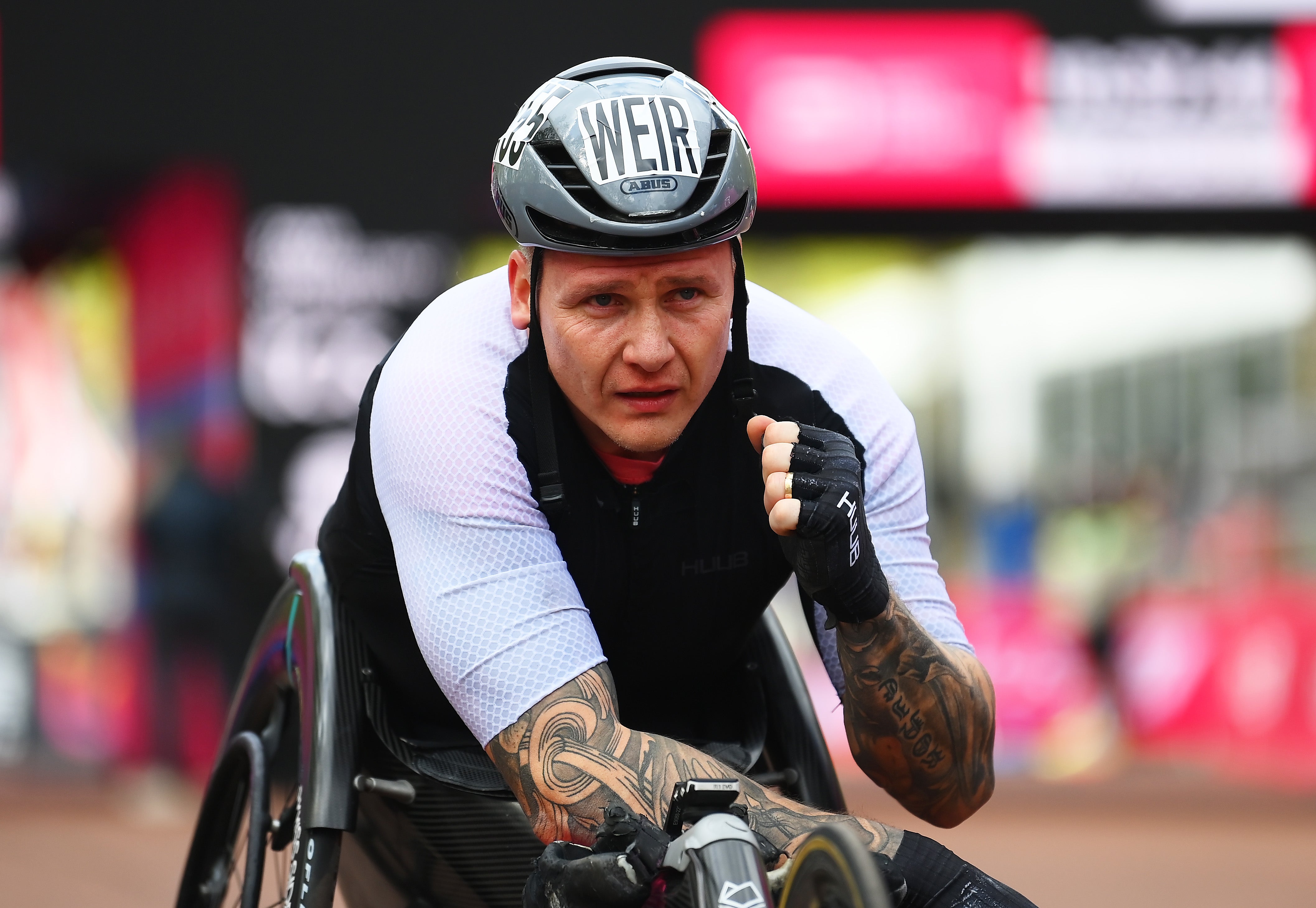 Third placed David Weir of Great Britain celebrates at the London Marathon 2024