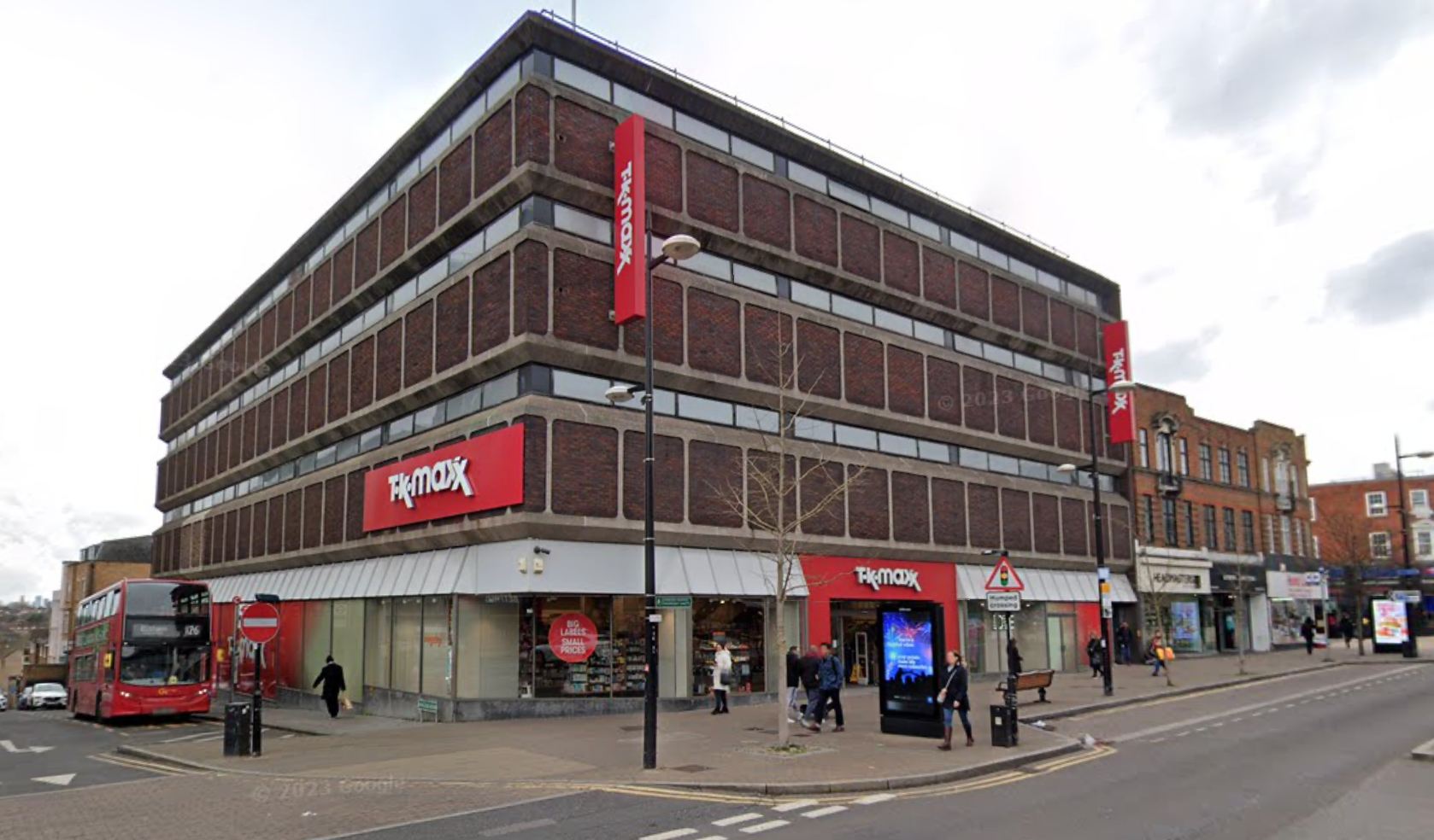 A man has been arrested on suspicion of kidnapping after allegedly picking a child up from a pram in a TK Maxx store