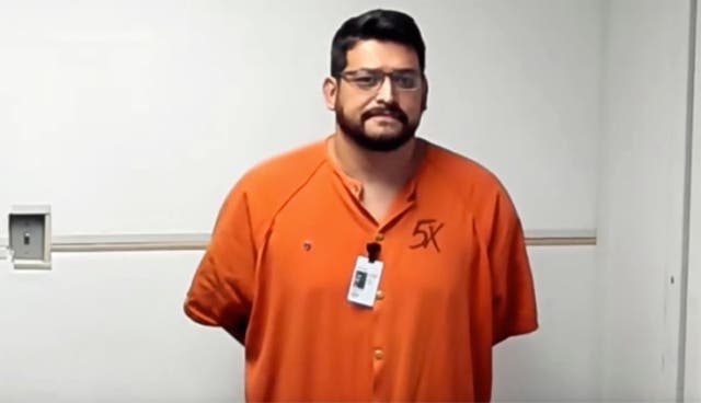 Eddie Duran in a holding room separate from court in Fort Walton Beach, Fla., Tuesday, Aug. 27, 2024