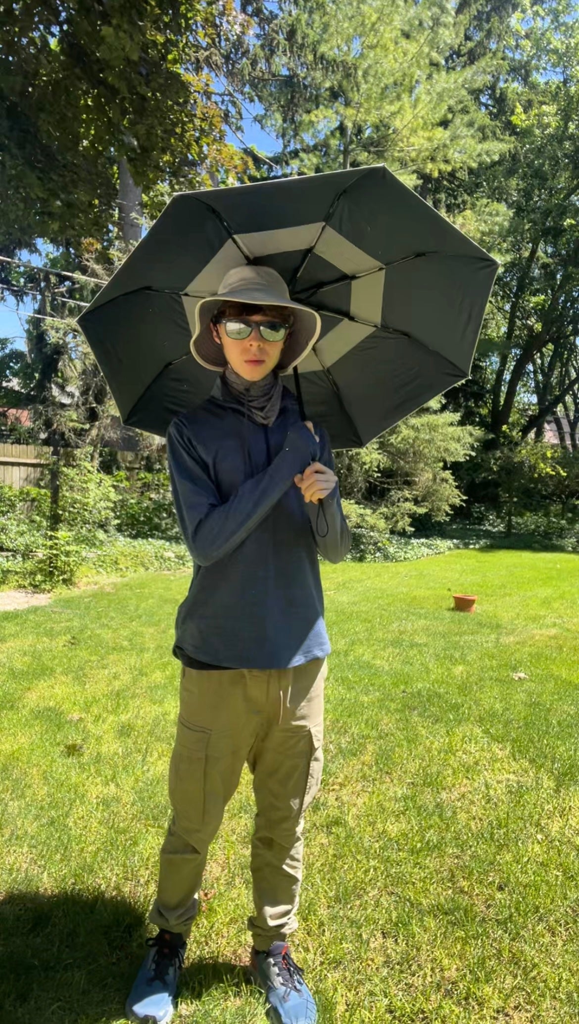 Mr Miles uses a ‘sunbrella’ whenever he is forced to go outside.