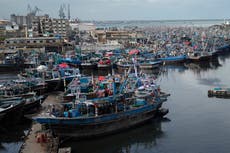 A storm developing in the Arabian Sea prompts Pakistani officials to shut schools in Karachi