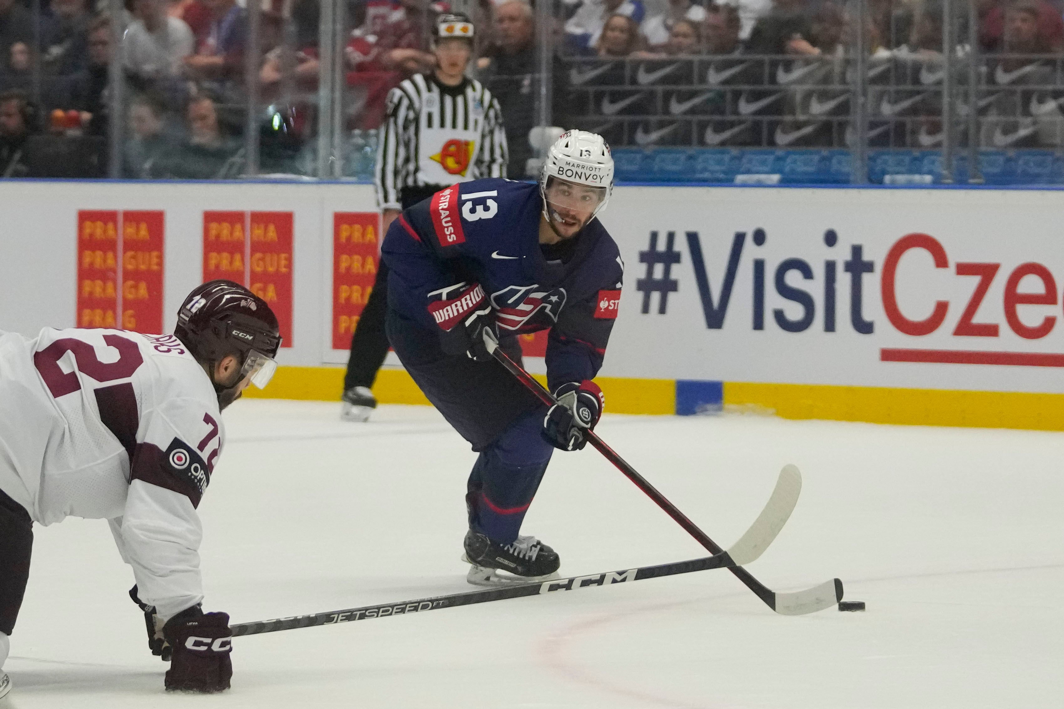 Johnny Gaudreau (pictured right during a hockey game) died on Thursday night