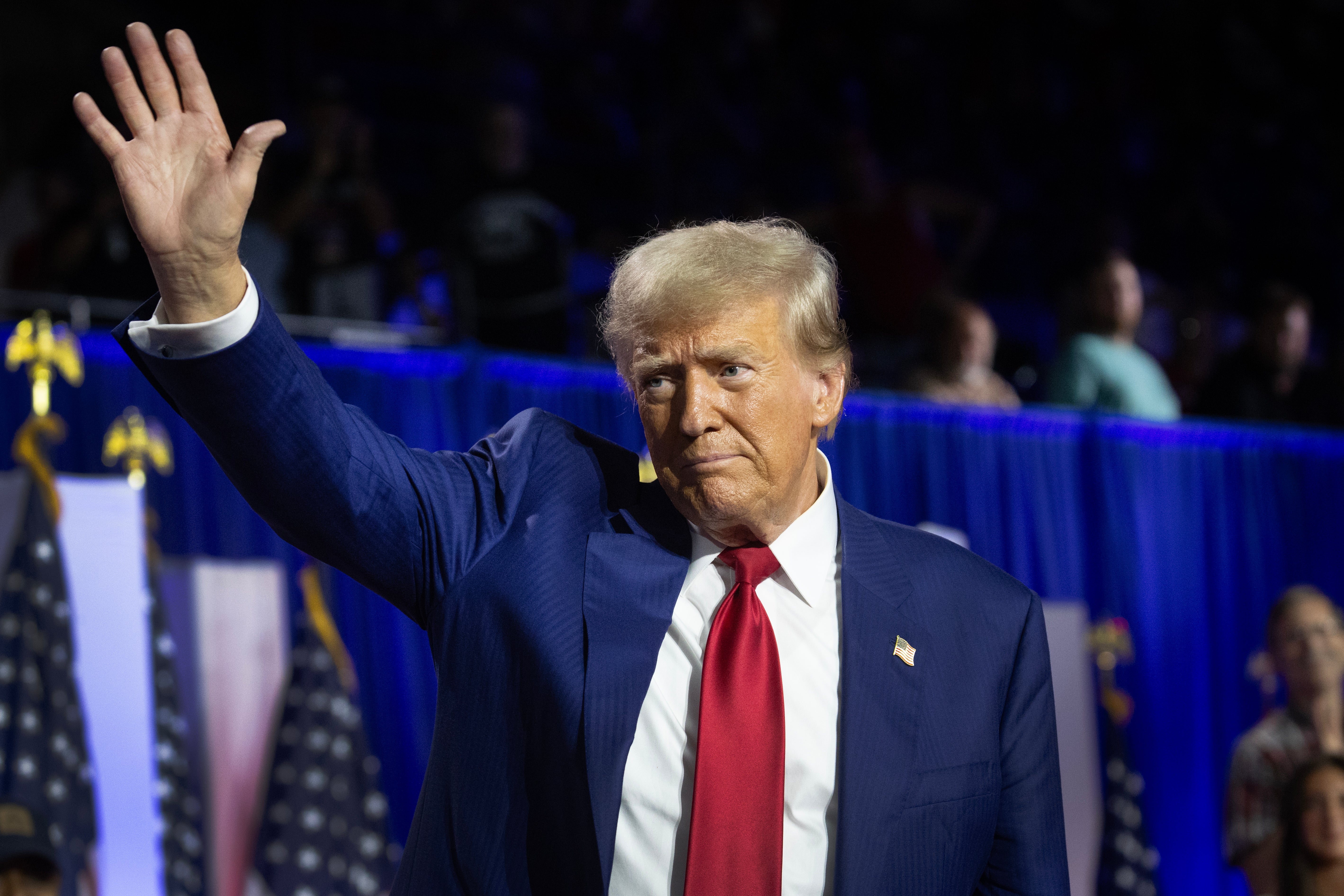 Donald Trump waves at a La Crosse, Wisconsin campaign event on Thursday. Two-thirds of Americans say Trump is not prepared to accept the results of the 2024 election, a new poll reveals