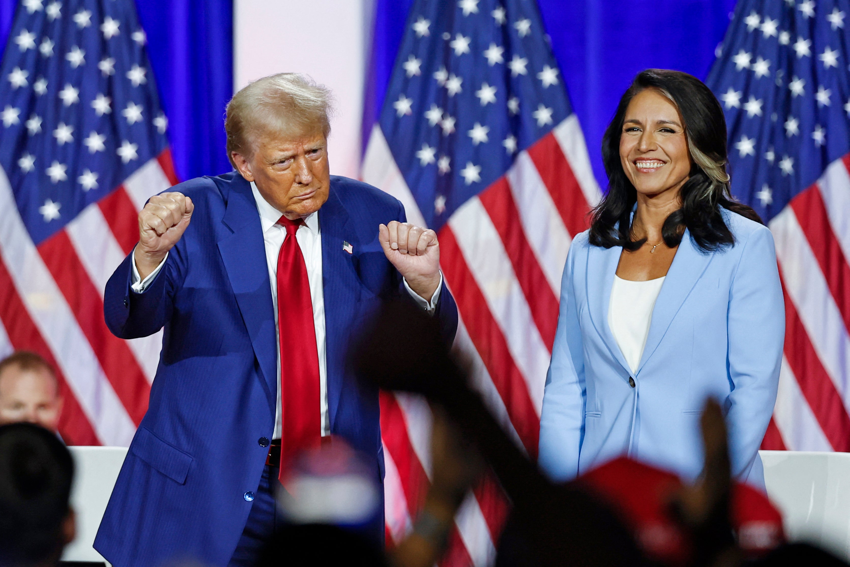 Tulsi Gabbard, right, said Trump would “stay focused on the issues that matter the most” during the debate - he did not.