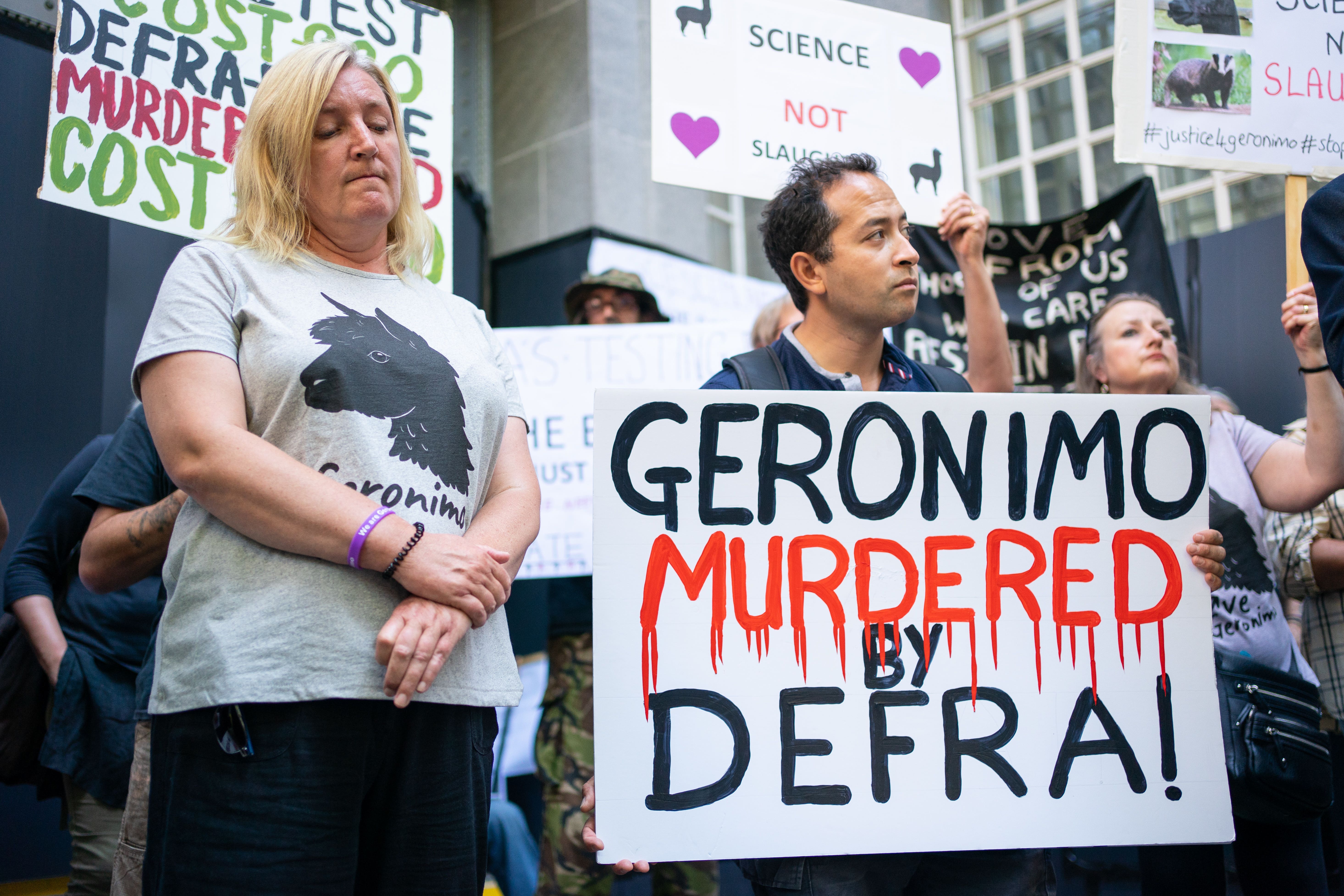 Helen Macdonald joins members of the Justice for Geronimo and Stop Badger Cull campaigns at a protest outside the offices of Department for Environment, Food and Rural Affairs in central London after Geronimo was culled (Dominic Lipinski/PA)