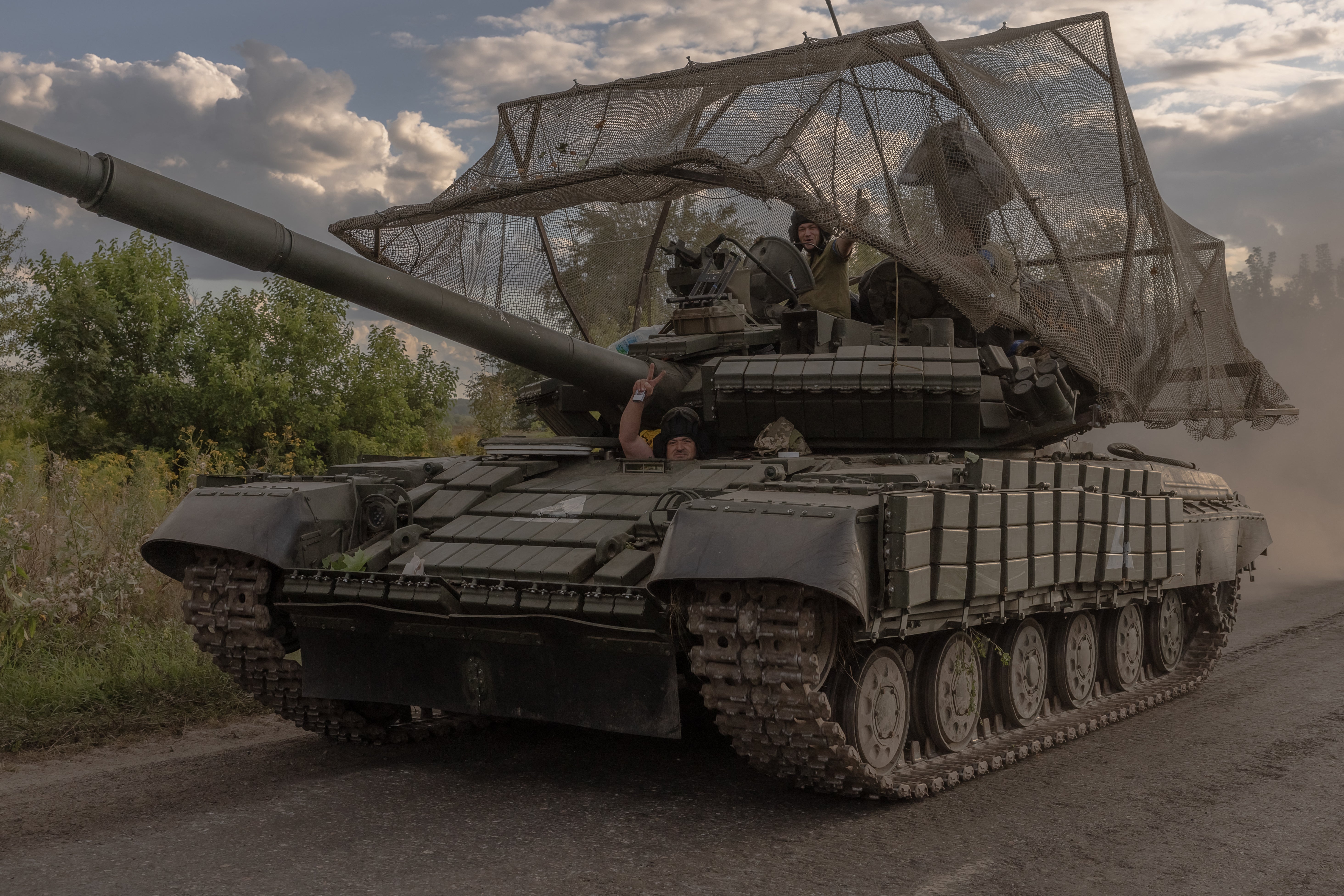 Ukraine troops on a tank near the Russian border in the Ukrainian region of Sumy