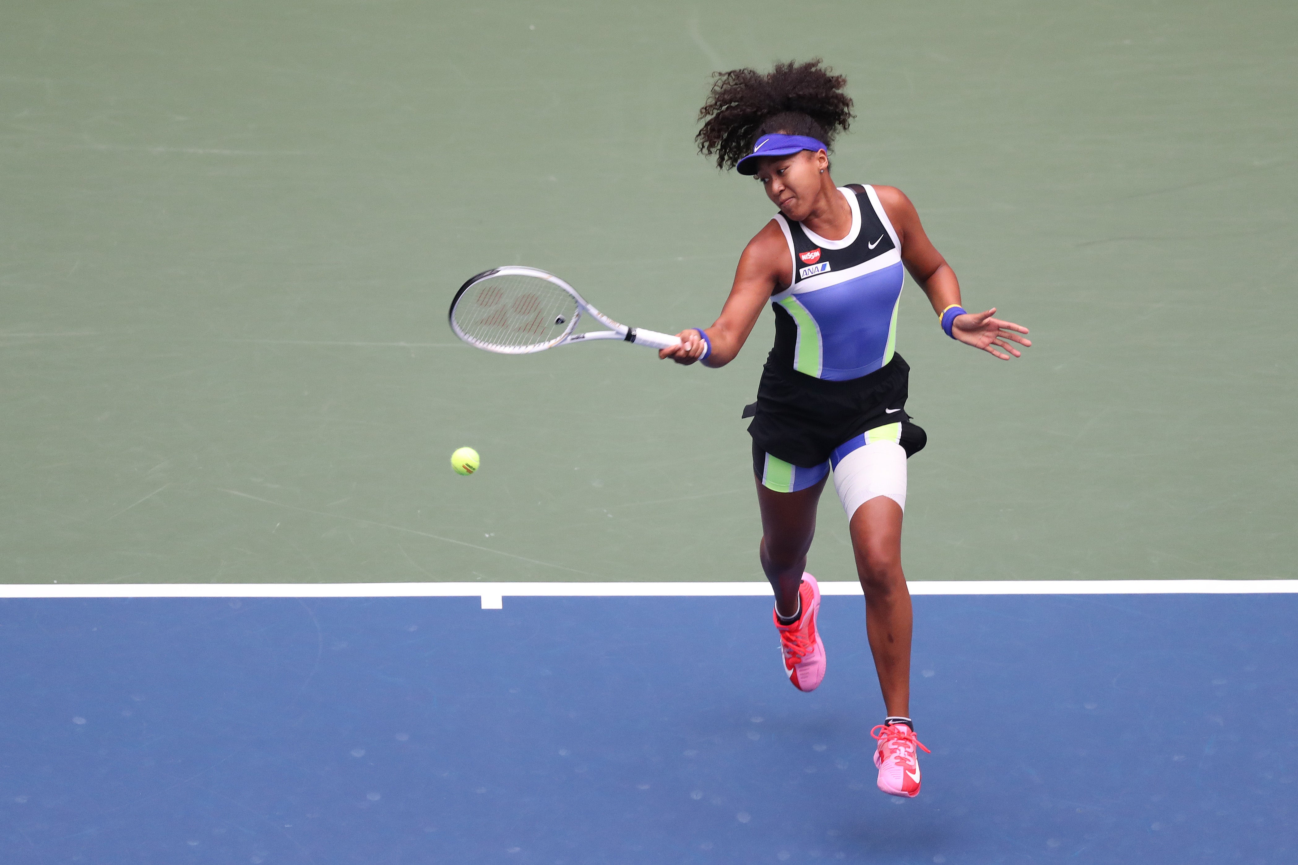 Naomi Osaka performs in a colorful Nike ensemble during the Women’s Singles final in 2020