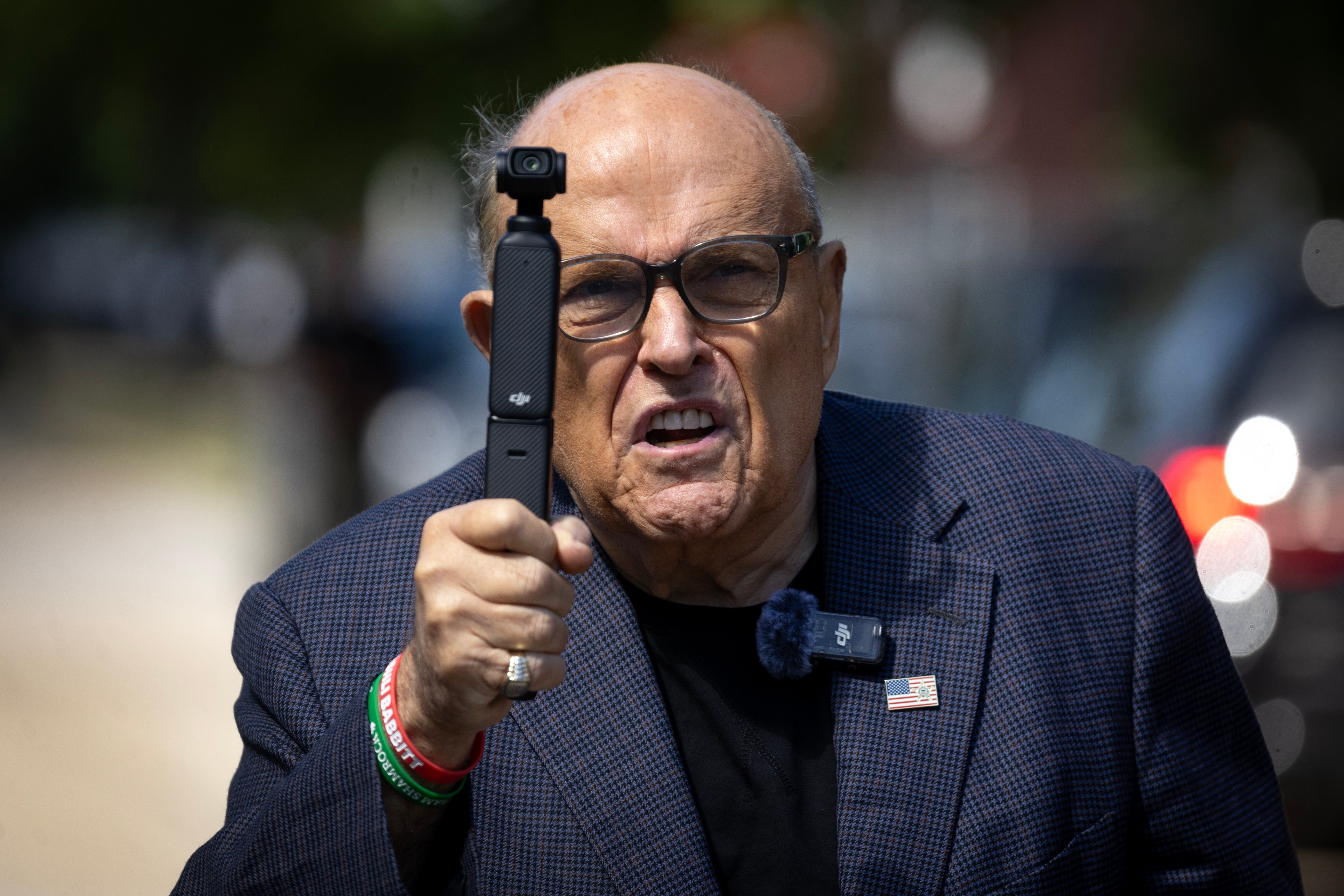 Election workers who won a defamation case against Rudy Giuliani are asking a court to begin seizing his assets to collect on what they are owed