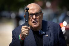 Election workers Giuliani defamed ask court to seize his assets after $148m verdict