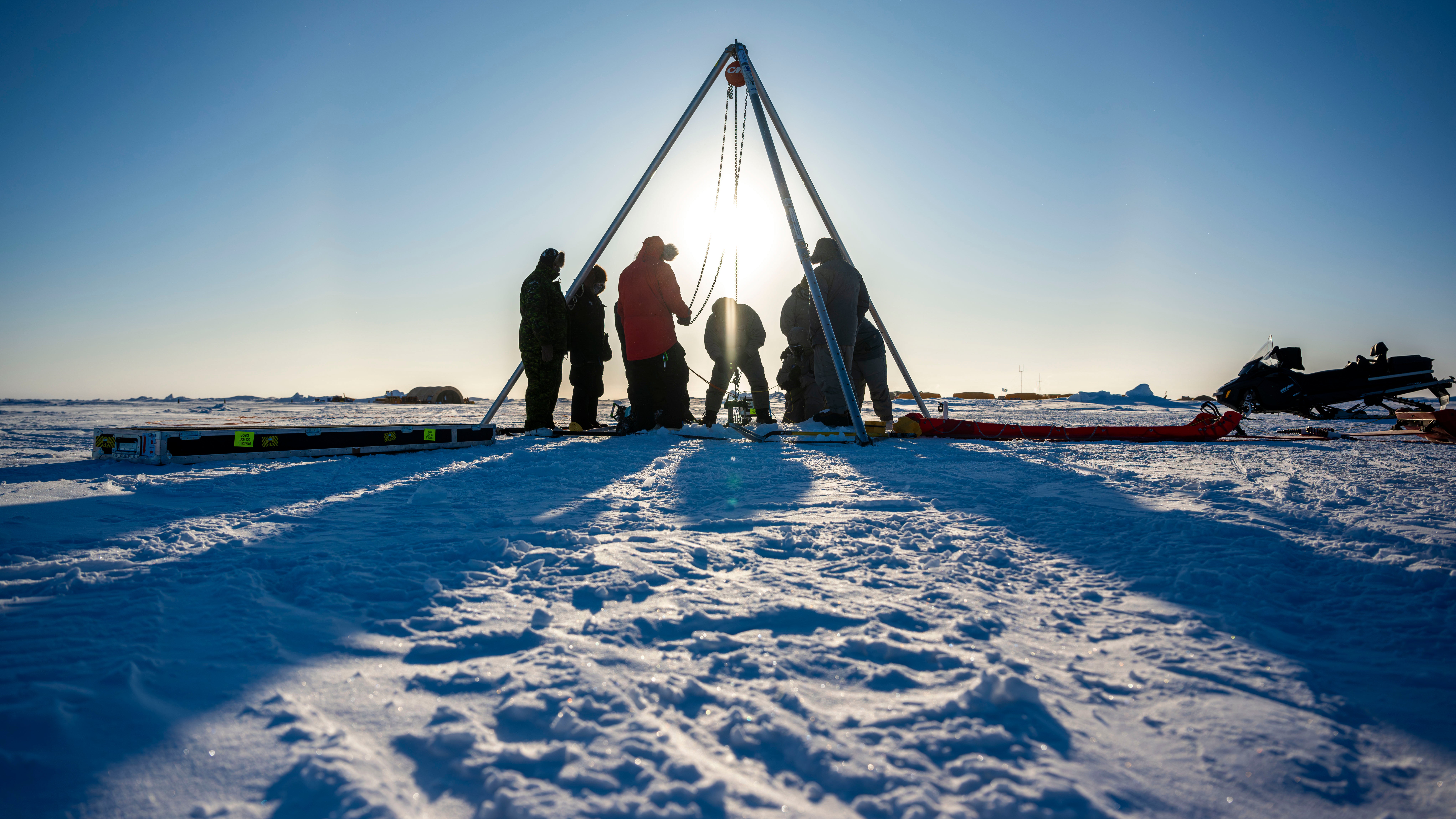 Scientists from Nasa’s Jet Propulsion Laboratory test a prototype ‘IceNode’ robot in the Beaufort Sea in March. The agency’s project sends the robots under ice to collect data for a year.