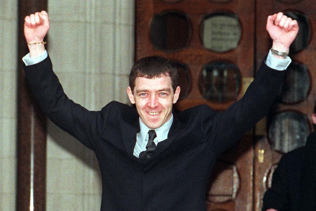 McCarroll celebrates his out-of-court settlement in 1999