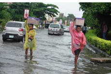 Floods in Nigeria have killed scores and washed away farmland, raising food security concerns