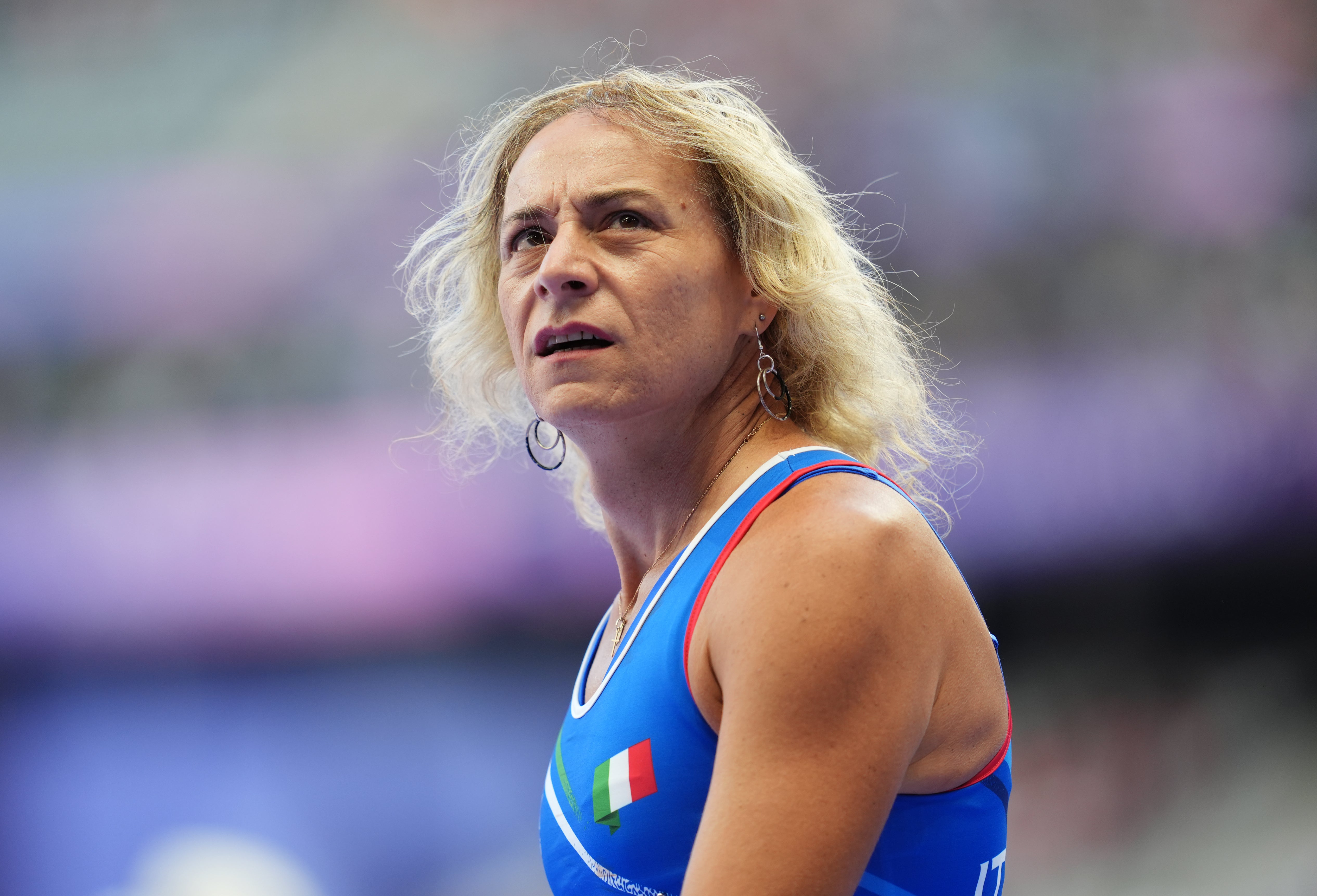 Valentina Petrillo reacts after finishing second in her 400m heat at the Paris Paralympics