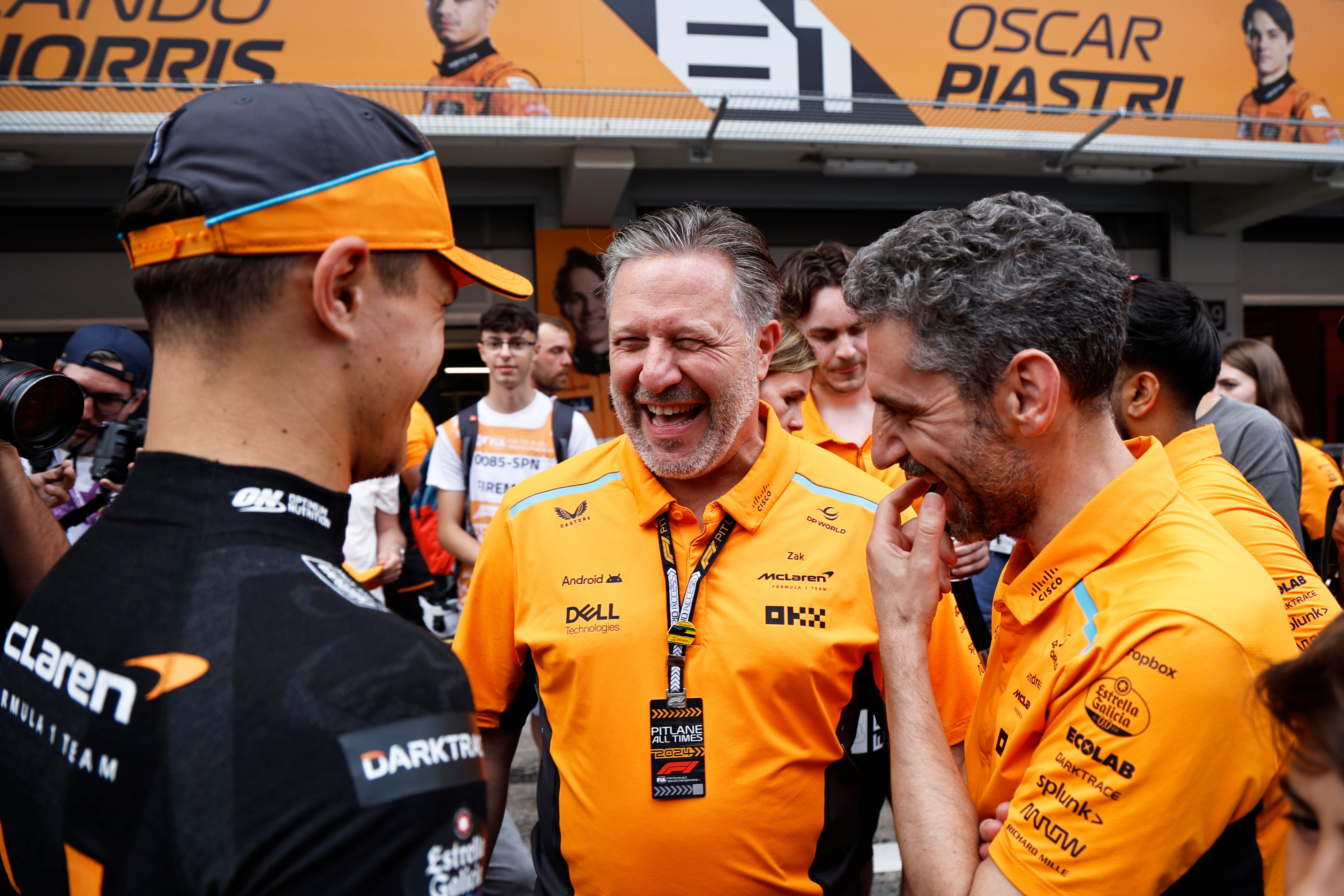 McLaren boss Zak Brown (centre) explained the meaning of ‘papaya rules’