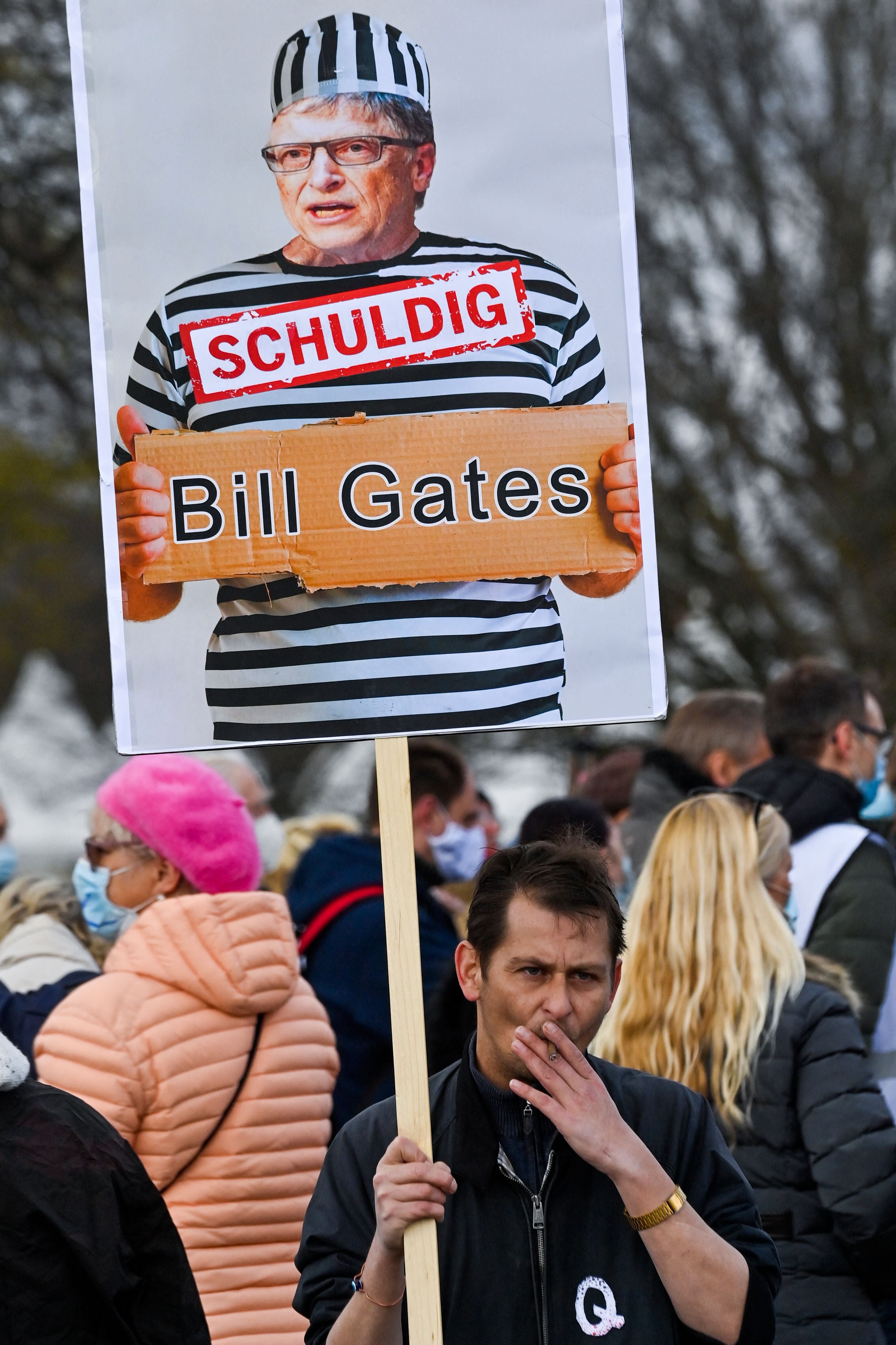 A protester at an anti-lockdown rally in Berlin in April 2021 holds a placard with an image of Bill Gates and the slogan: ‘Guilty’