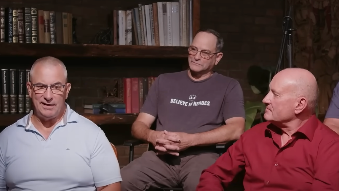 Paul Herr (left), Rodney Tow (center) and Tom Behrends served with Tim Walz in the National Guard. They are now criticizing the vice presidential candidate for leaving the National Guard shortly before his unit was deployed to Iraq