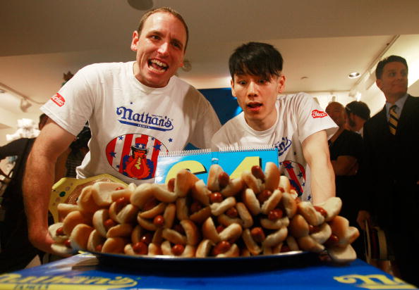 Joey Chestnut and Takeru Kobayashi compete in a Labor Day hot dog eating contest