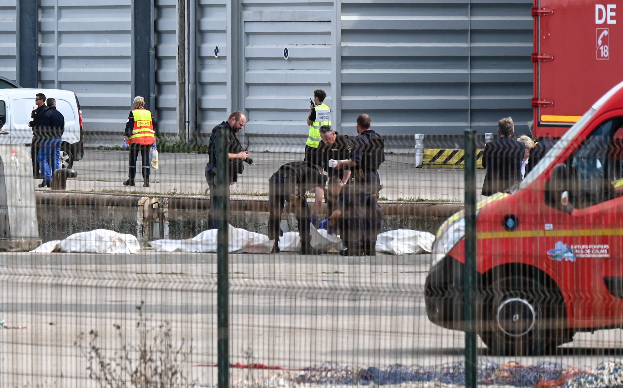 Bodies of dead migrants are brought ashore in Boulogne-sur-Mer