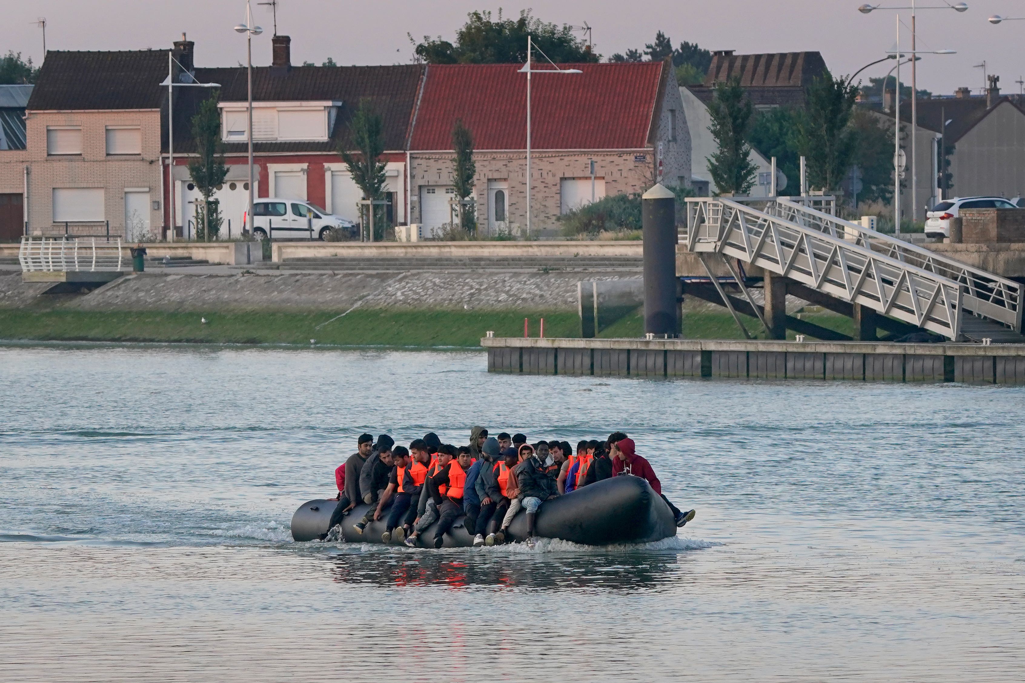 A group of people thought to be migrants leave Gravelines in France on a small boat in an attempt to cross the Channel (Gareth Fuller/PA)