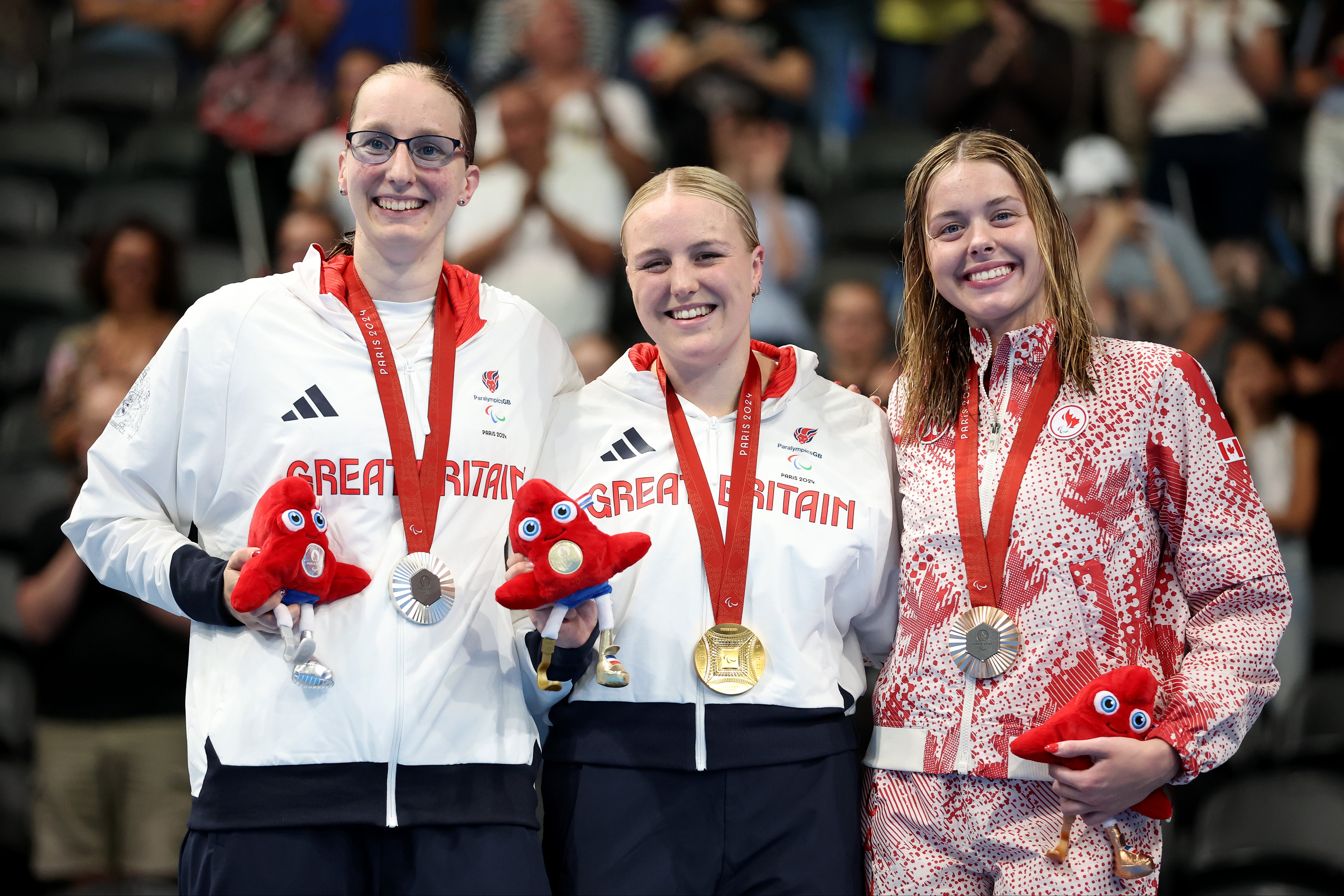 Faye Rogers (centre) beat teammate Callie-Ann Warrington (left) to gold