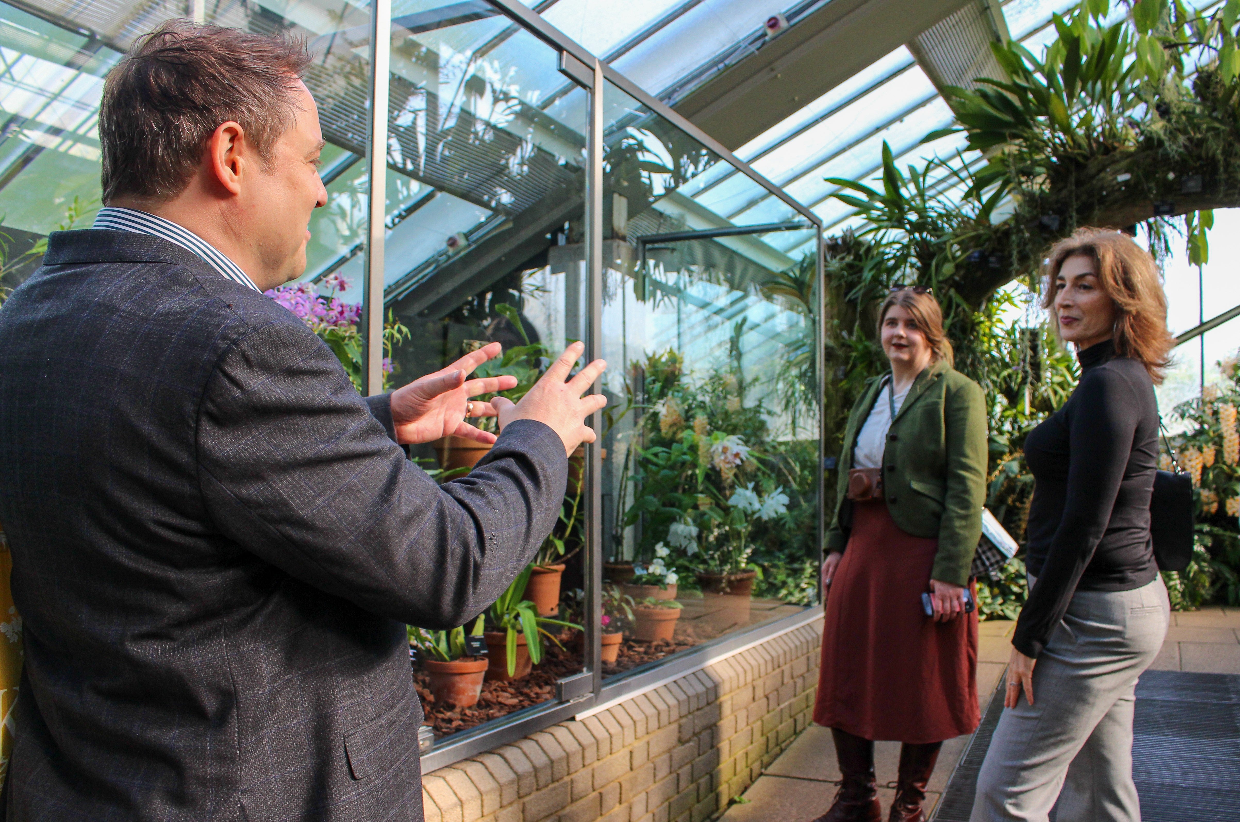 Project managers discuss the illegal plant trade at the Princess of Wales Conservatory in Kew Gardens