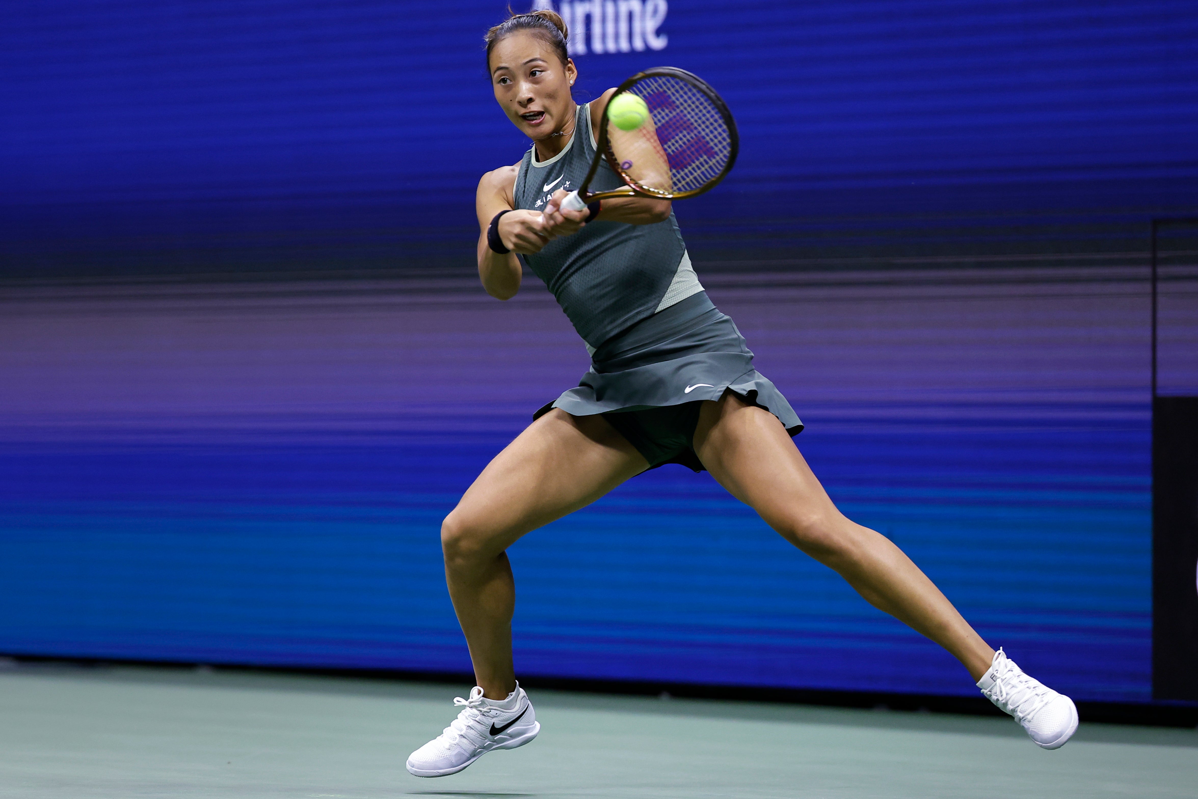 Zheng Qinwen of China faces Aryna Sabalenka of Belarus in the quarterfinals of the US Open on Tuesday, Sept. 3, 2024, in New York. (AP Photo/Adam Hunger)