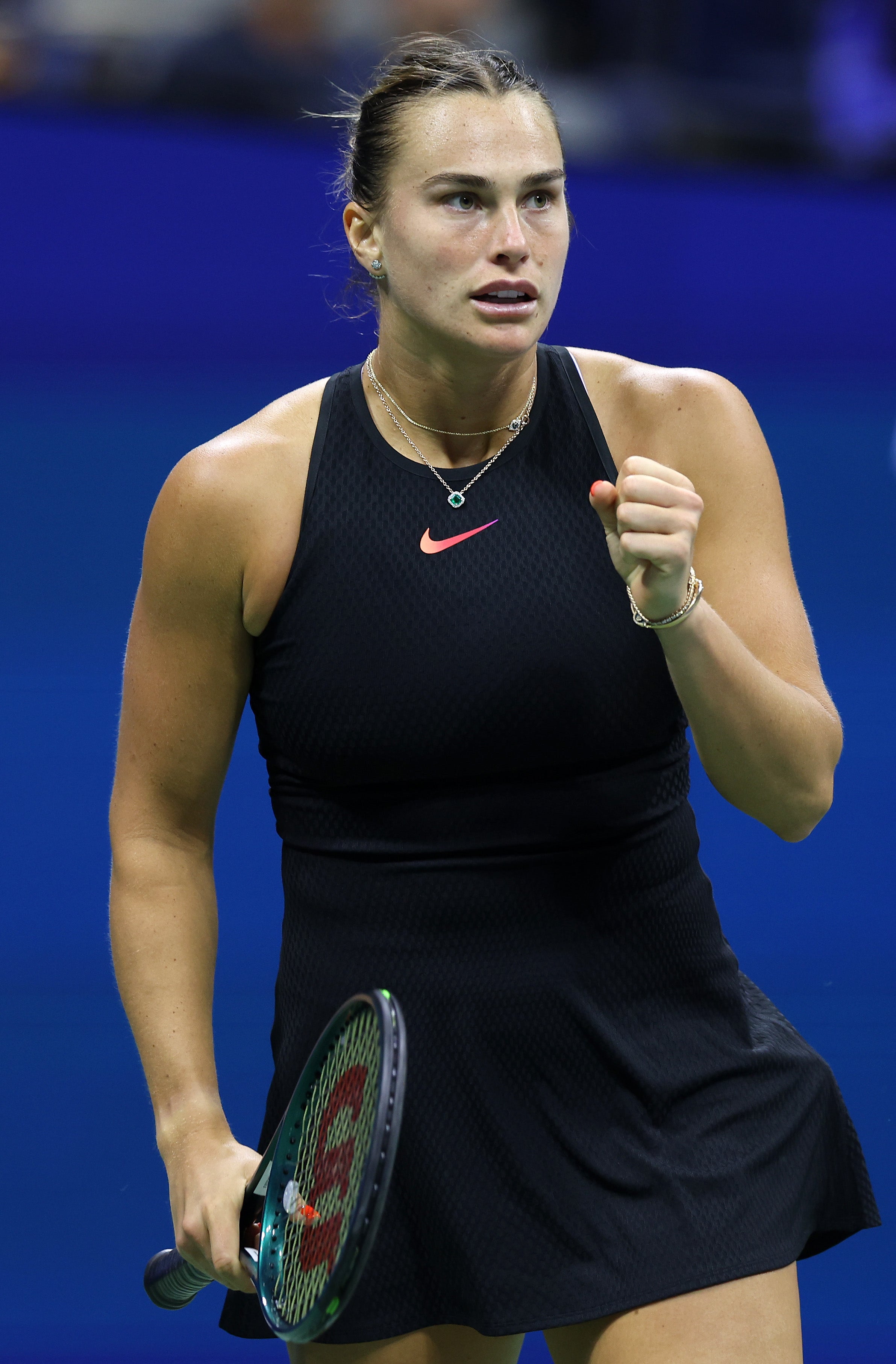 NEW YORK, NEW YORK – SEPTEMBER 03: Aryna Sabalenka of Belarus celebrates a point against Zheng Qinwen of China during their women's singles quarterfinal match on day nine of the 2024 US Open at the USTA Billie Jean King National Tennis Center on September 3, 2024 in the Flushing neighborhood of the Queens borough of New York City. (Photo by Jamie Squire/Getty Images)